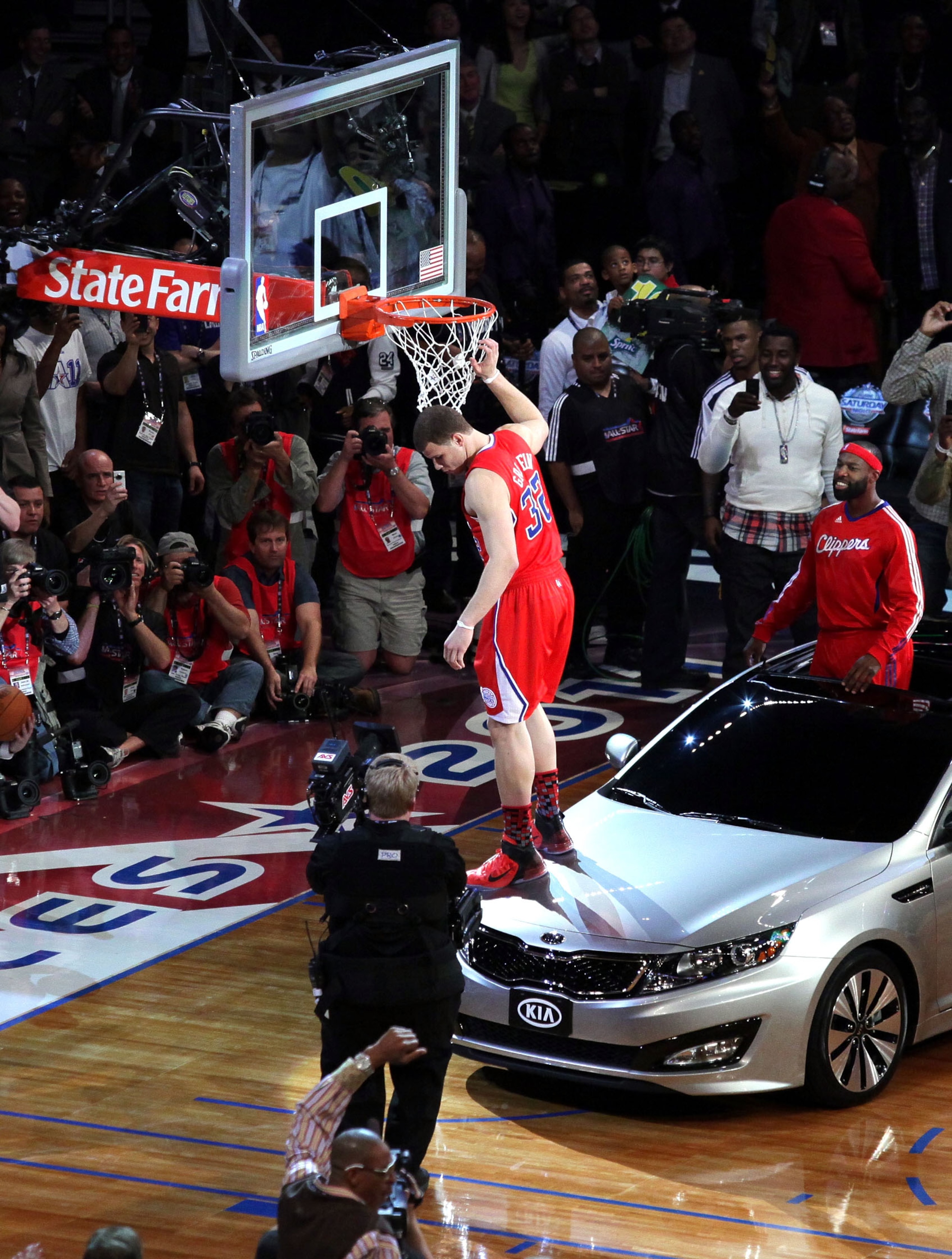 LOS ANGELES, CA - FEBRUARY 19:  Blake Griffin from the L.A. Clippers slam dunks over a car with teammate Baron Davis inside during the Sprite Slam Dunk Contest apart of NBA All-Star Saturday Night at Staples Center on February 19, 2011 in Los Angeles, Cal