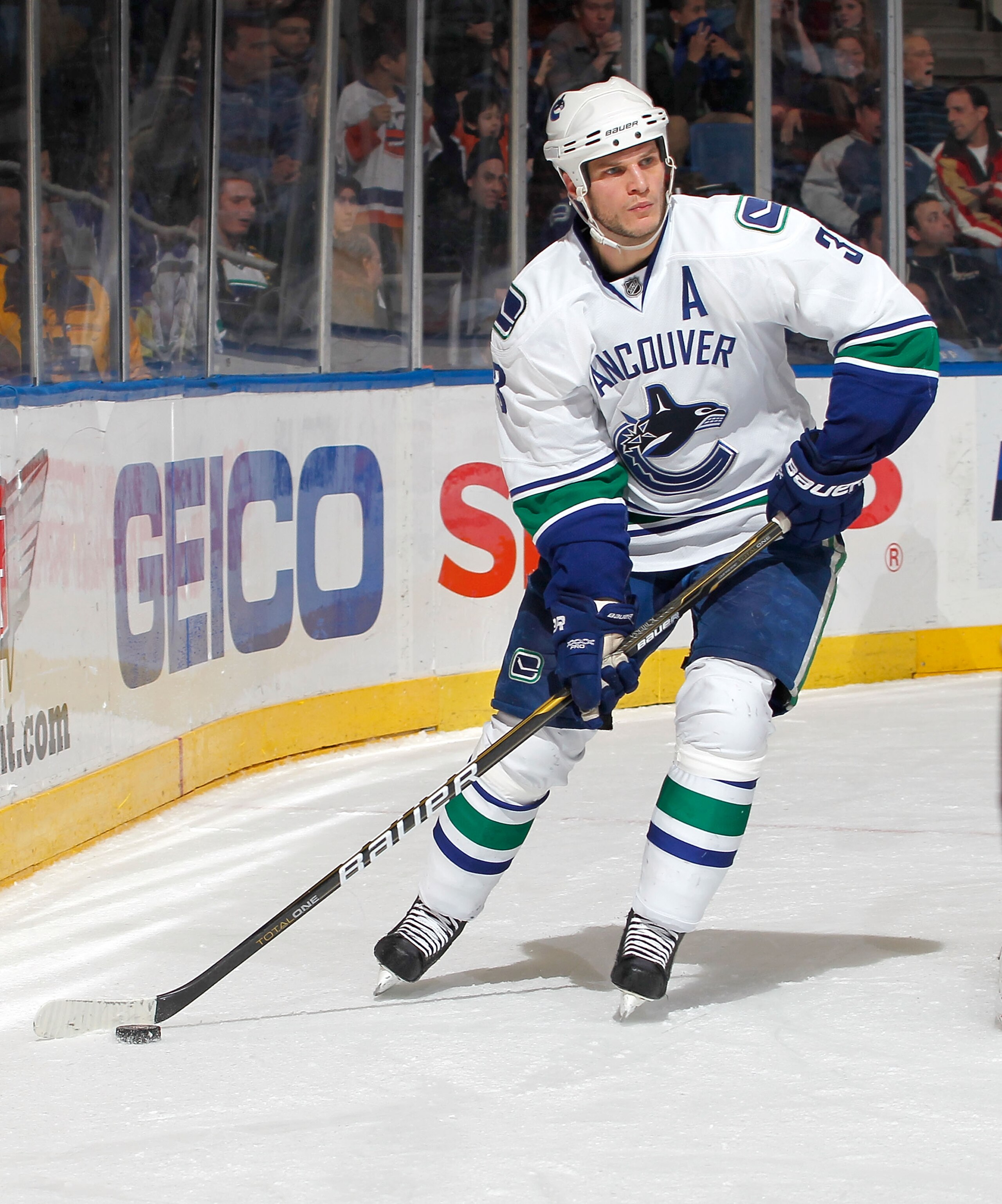 UNIONDALE, NY - JANUARY 11:  Kevin Bieksa #3 of the Vancouver Canucks skates during an NHL game against the New York Islanders at Nassau Coliseum on January 11, 2011 in Uniondale, New York.  (Photo by Paul Bereswill/Getty Images)