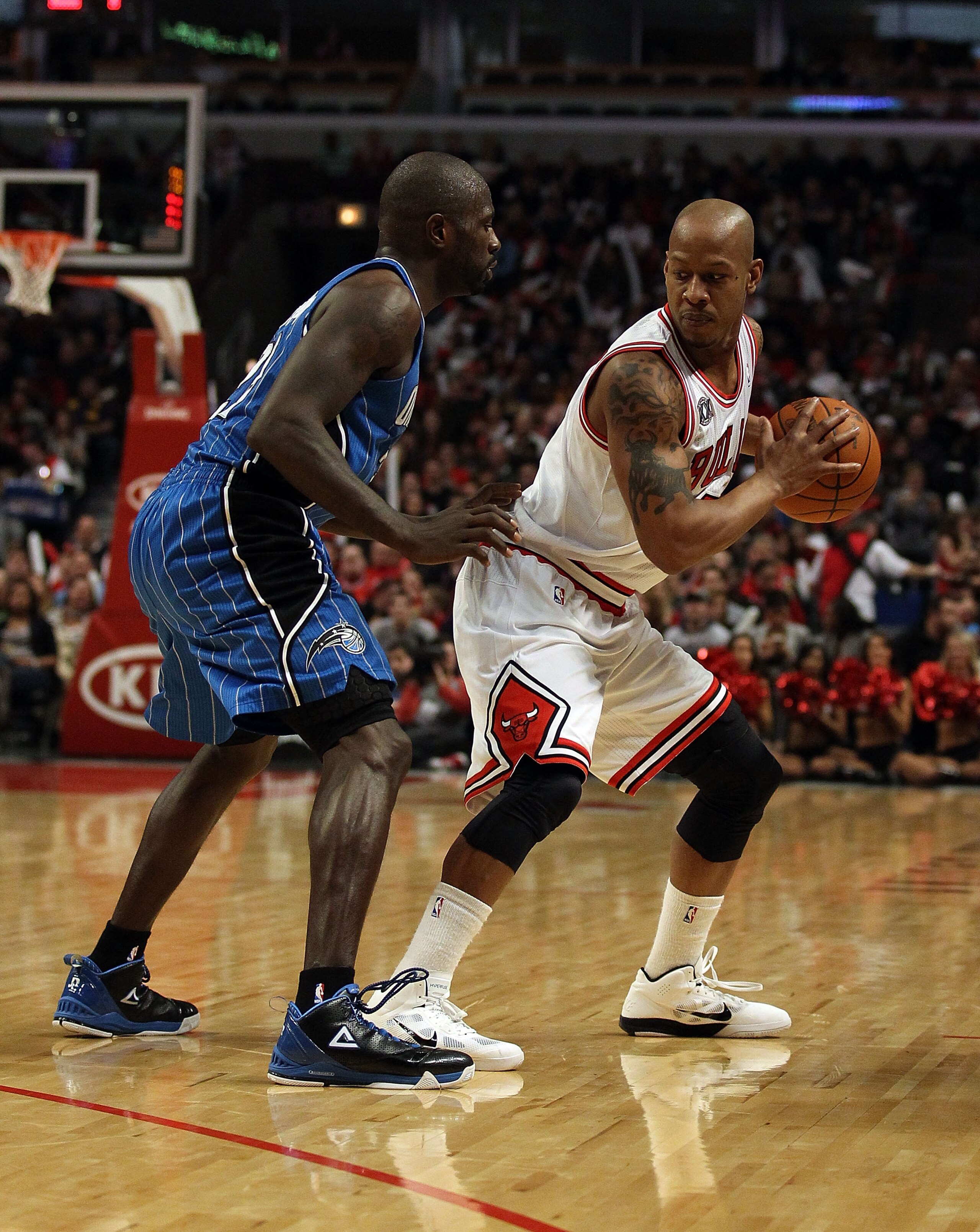 CHICAGO, IL - JANUARY 28: Keith Bogans #6 of the Chicago Bulls prepares to move against Jason Richardson #23 of the Orlando Magic at the United Center on January 28, 2011 in Chicago, Illinois. The Bulls defeated the Magic 99-90. NOTE TO USER: User express CHICAGO, IL - JANUARY 28: Keith Bogans #6 of the Chicago Bulls prepares to move against Jason Richardson #23 of the Orlando Magic at the United Center on January 28, 2011 in Chicago, Illinois. The Bulls defeated the Magic 99-90. NOTE TO USER: User express