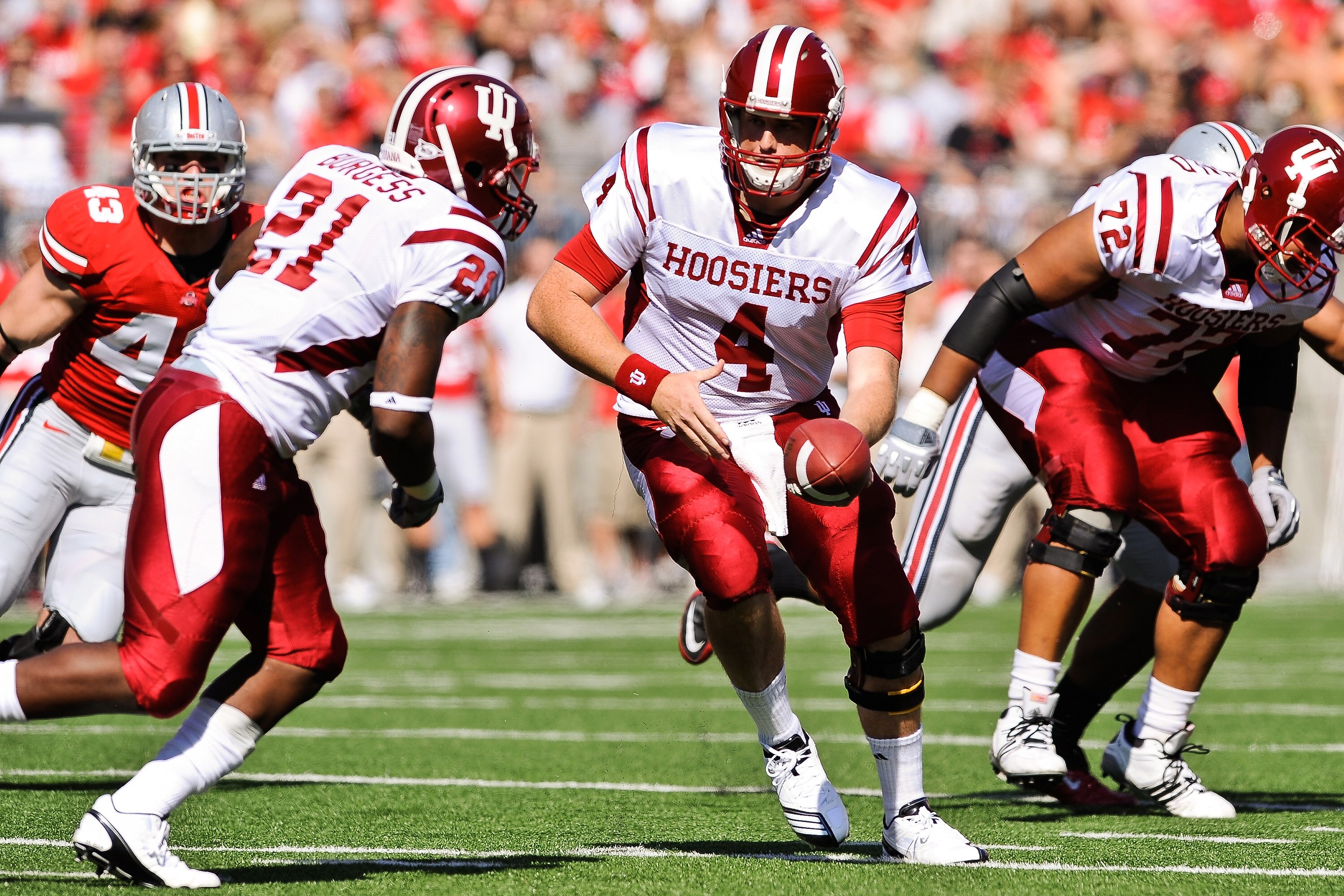 COLUMBUS, OH - OCTOBER 9: Quarterback Ben Chappell #4 of the Indiana Hoosiers hands off against the Ohio State Buckeyes at Ohio Stadium on October 9, 2010 in Columbus, Ohio. (Photo by Jamie Sabau/Getty Images) COLUMBUS, OH - OCTOBER 9: Quarterback Ben Chappell #4 of the Indiana Hoosiers hands off against the Ohio State Buckeyes at Ohio Stadium on October 9, 2010 in Columbus, Ohio. (Photo by Jamie Sabau/Getty Images)
