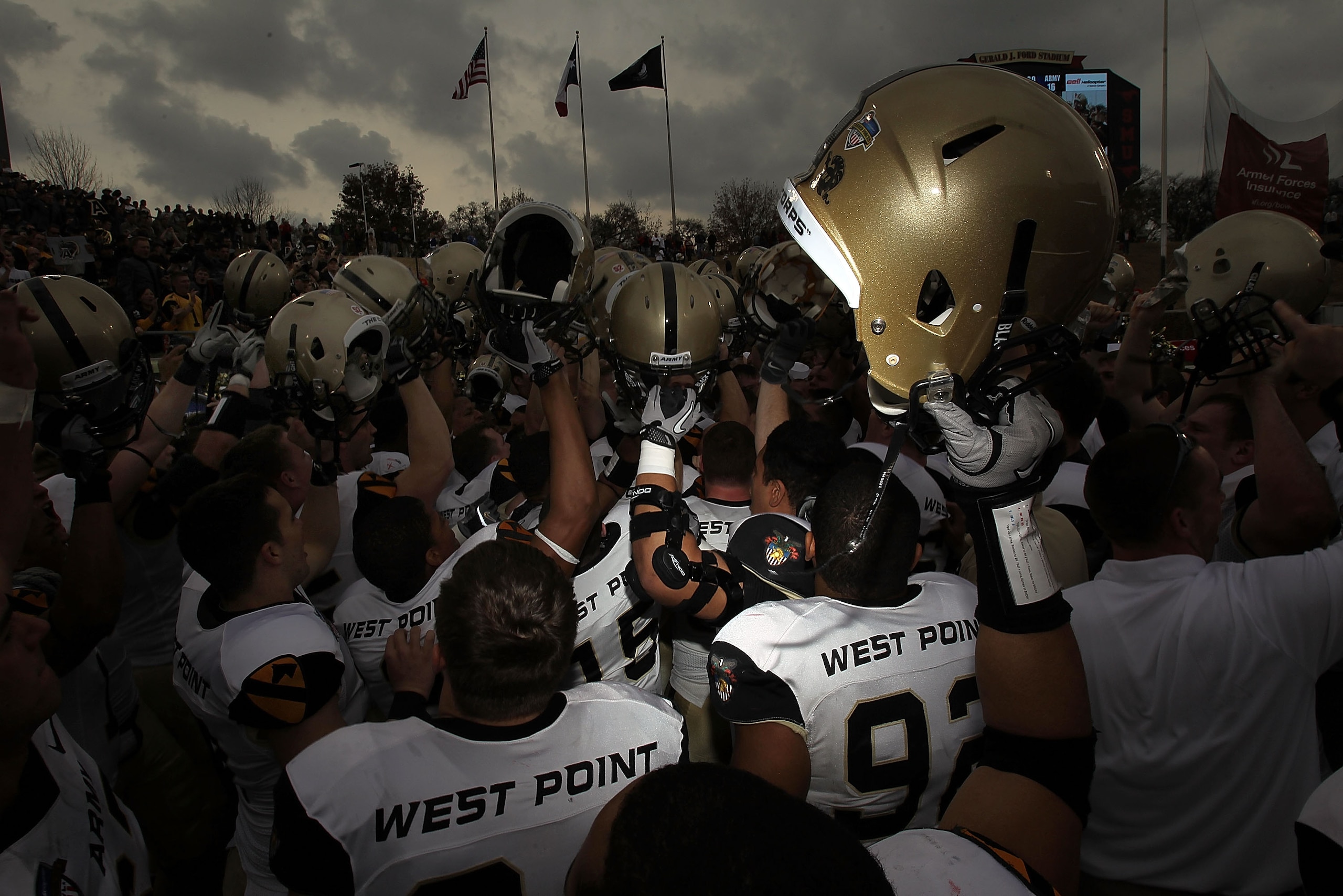 DALLAS, TX - DECEMBER 30:  The Army Black Knights celebrate a 16-14 win against the SMU Mustangs during the Bell Helicopter Armed Forces Bowl at Gerald J. Ford Stadium on December 30, 2010 in Dallas, Texas.  (Photo by Ronald Martinez/Getty Images)