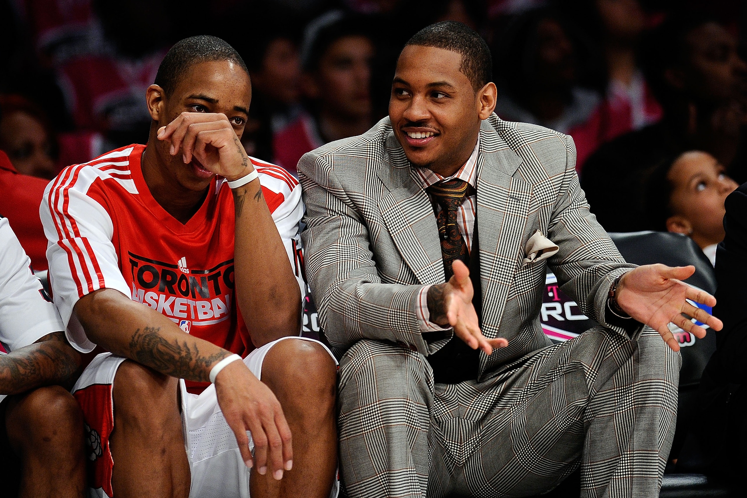 LOS ANGELES, CA - FEBRUARY 18: DeMar DeRozan #10 of the Toronto Raptors and the Sophomore Team talks with Carmelo Anthony of the Denver Nuggets on the bench during the T-Mobile Rookie Challenge and Youth Jam at Staples Center on February 18, 2011 in Los LOS ANGELES, CA - FEBRUARY 18: DeMar DeRozan #10 of the Toronto Raptors and the Sophomore Team talks with Carmelo Anthony of the Denver Nuggets on the bench during the T-Mobile Rookie Challenge and Youth Jam at Staples Center on February 18, 2011 in Los
