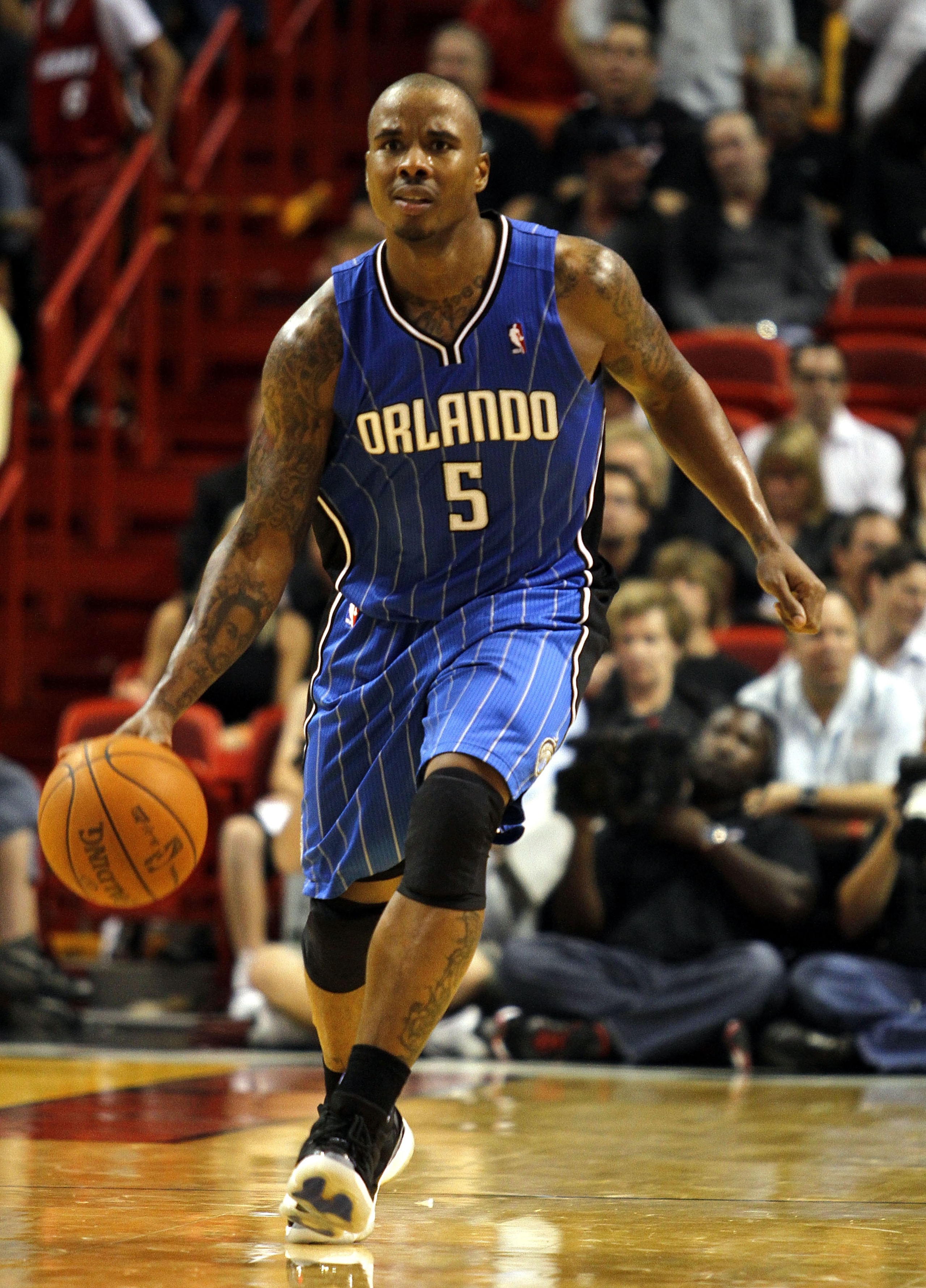 MIAMI - OCTOBER 29:  Guard Quentin Richardson #5 of the Orlando Magic brings up the ball against the Miami Heat at American Airlines Arena on October 29, 2010 in Miami, Florida.  NOTE TO USER: User expressly acknowledges and agrees that, by downloading an