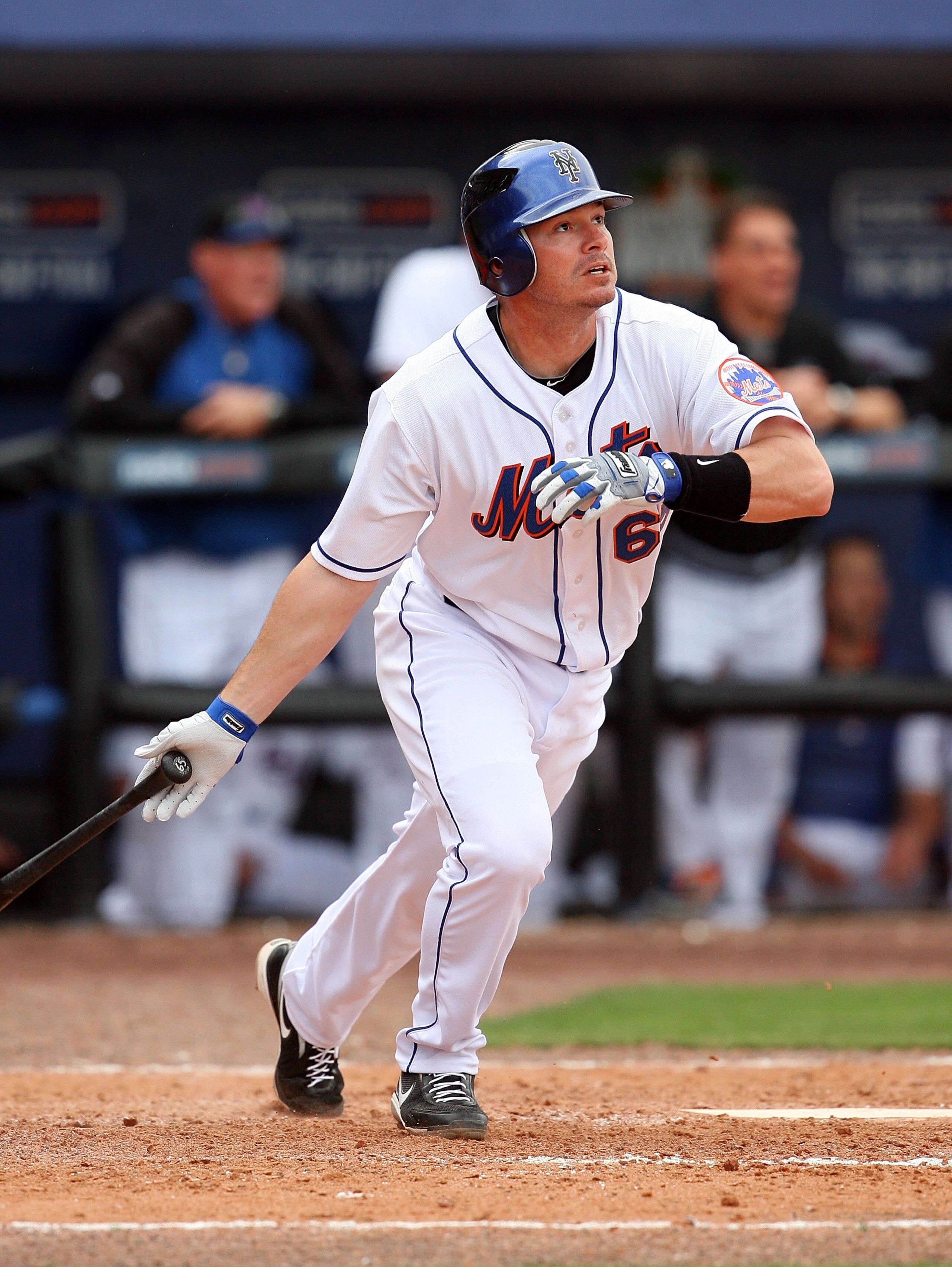 PORT ST. LUCIE, FL - MARCH 02:  Russ Adams #65 of the New York Mets hits a solo home run against the Atlanta Braves at Tradition Field on March 2, 2010 in Port St. Lucie, Florida.  (Photo by Doug Benc/Getty Images)