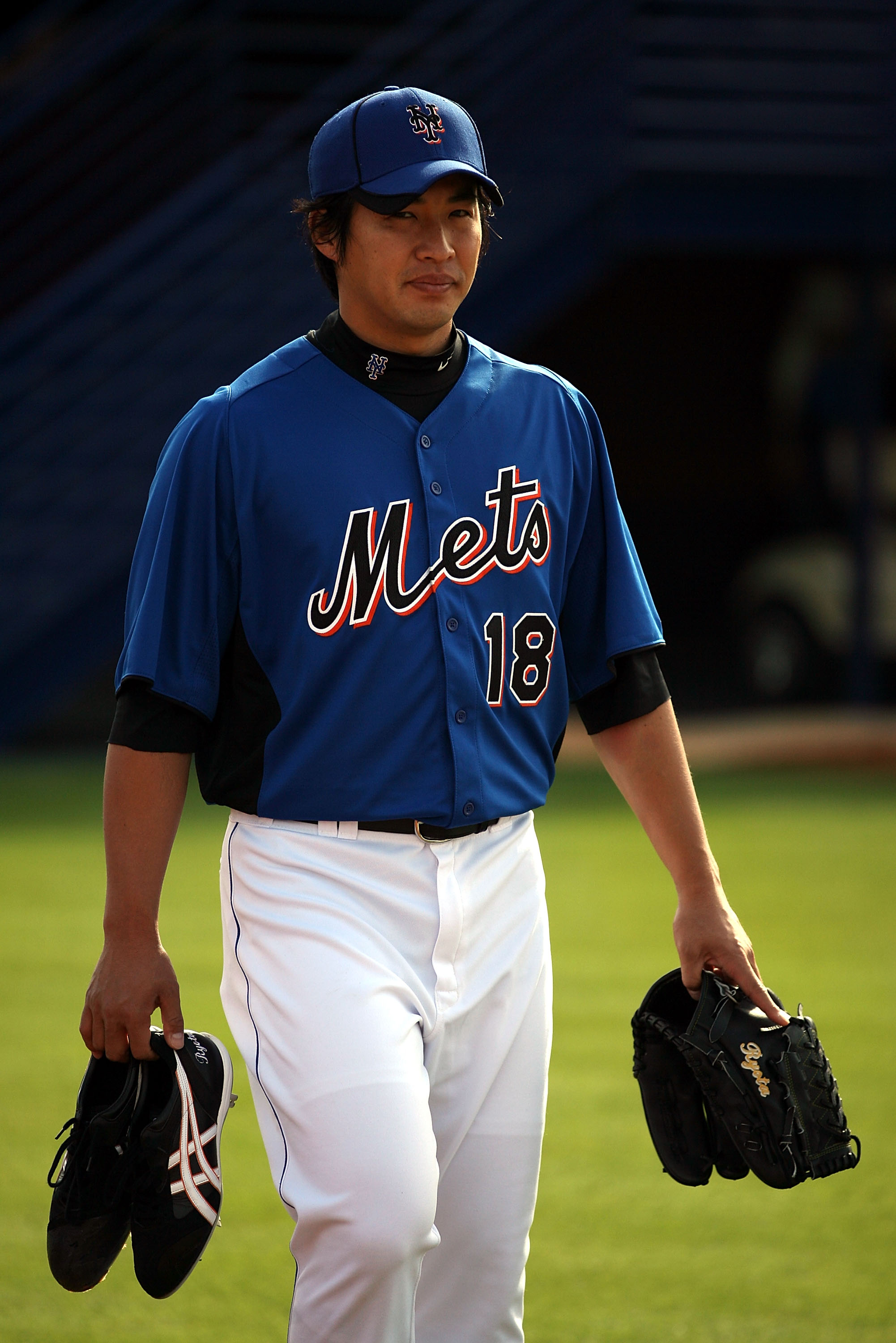 PORT ST. LUCIE, FL - FEBRUARY 17: Pitcher Ryota Igarashi #18 of the New York Mets works out during spring training at Tradition Field on February 17, 2011 in Port St. Lucie, Florida.  (Photo by Marc Serota/Getty Images)