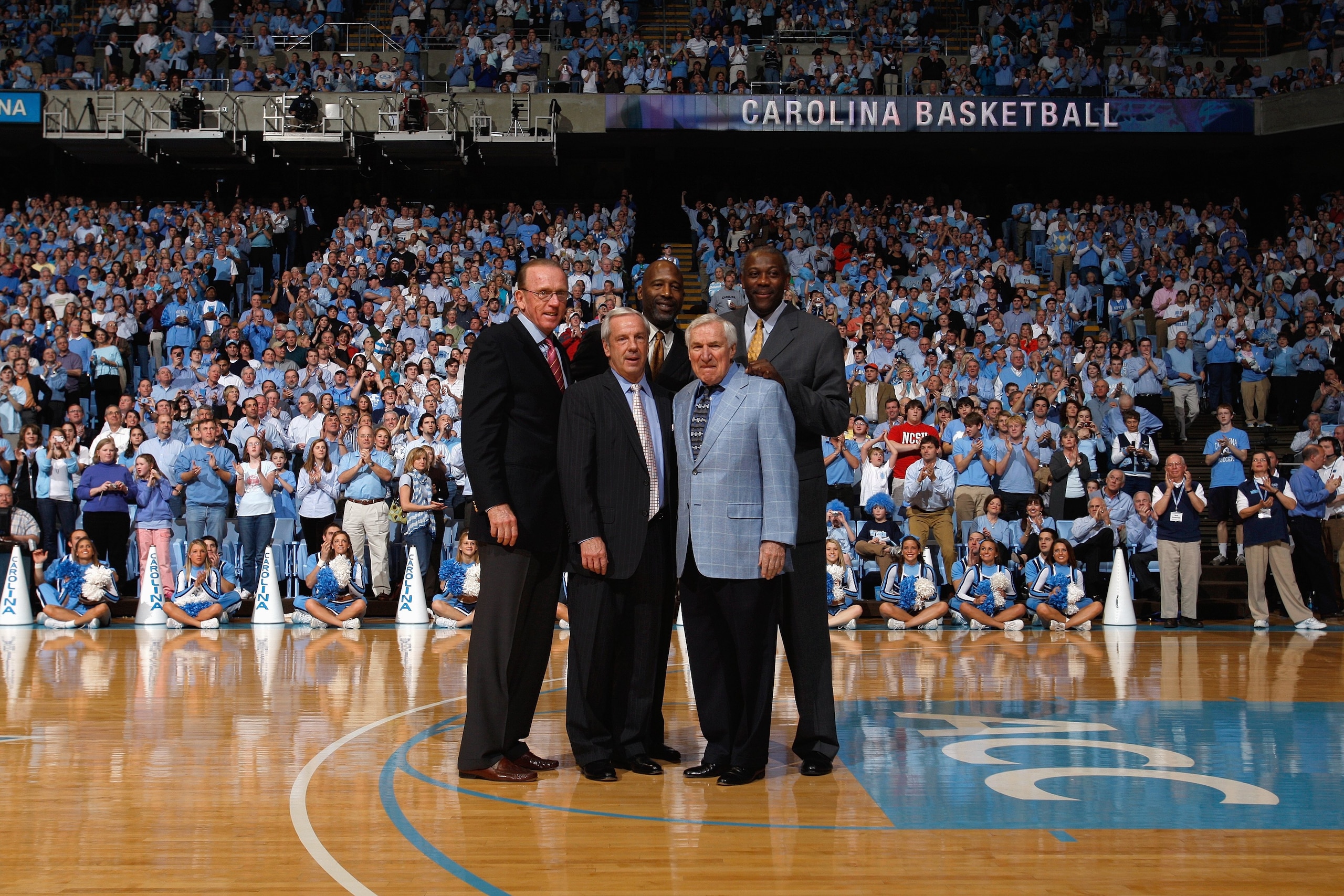 CHAPEL HILL, NC - FEBRUARY 07:  (L-R) North Carolina Tar Heels Hall of Famers Billy Cunningham, Roy Williams, James Worthy, Dean Smith and Bob McAdoo are honored during halftime of the game against the Virginia Cavaliers on February 7, 2009 at the Dean E.