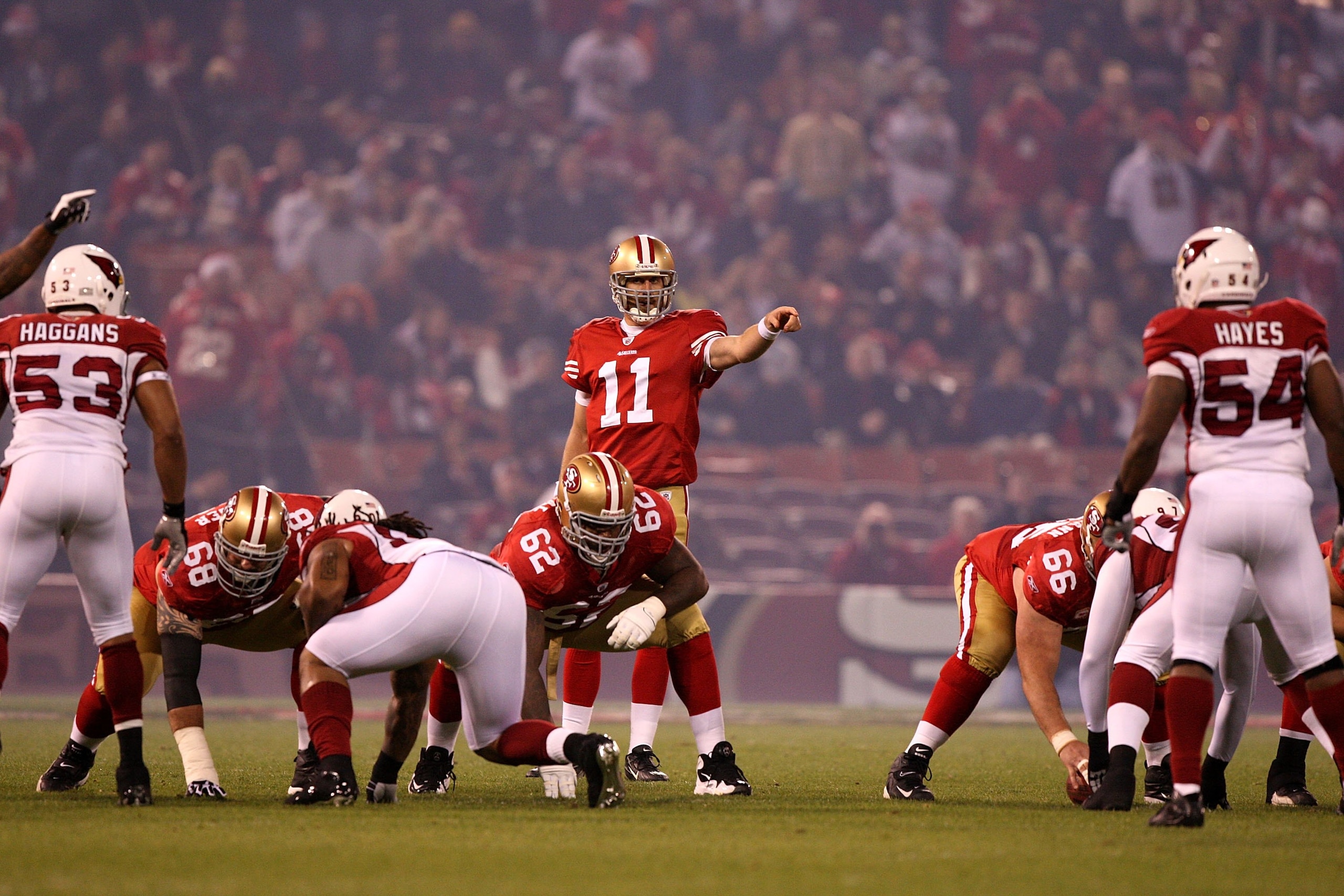 SAN FRANCISCO - DECEMBER 14:  Alex Smith #11 of the San Francisco 49ers in action against the Arizona Cardinals at Candlestick Park on December 14, 2009 in San Francisco, California.  (Photo by Jed Jacobsohn/Getty Images)