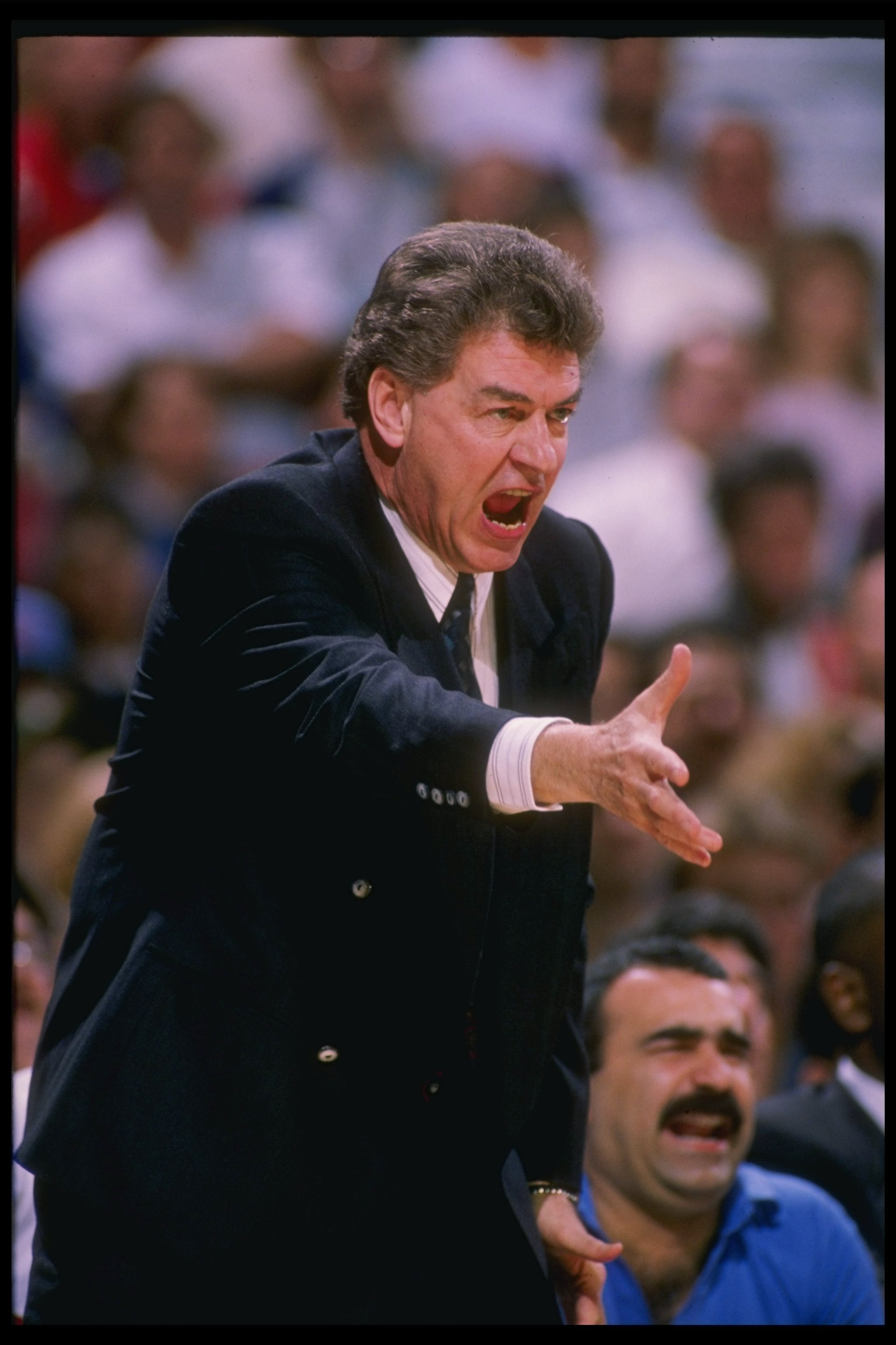 1988-1989:  Coach Chuck Daly of the Detroit Pistons yells from the sidelines. Mandatory Credit: Tim de Frisco  /Allsport