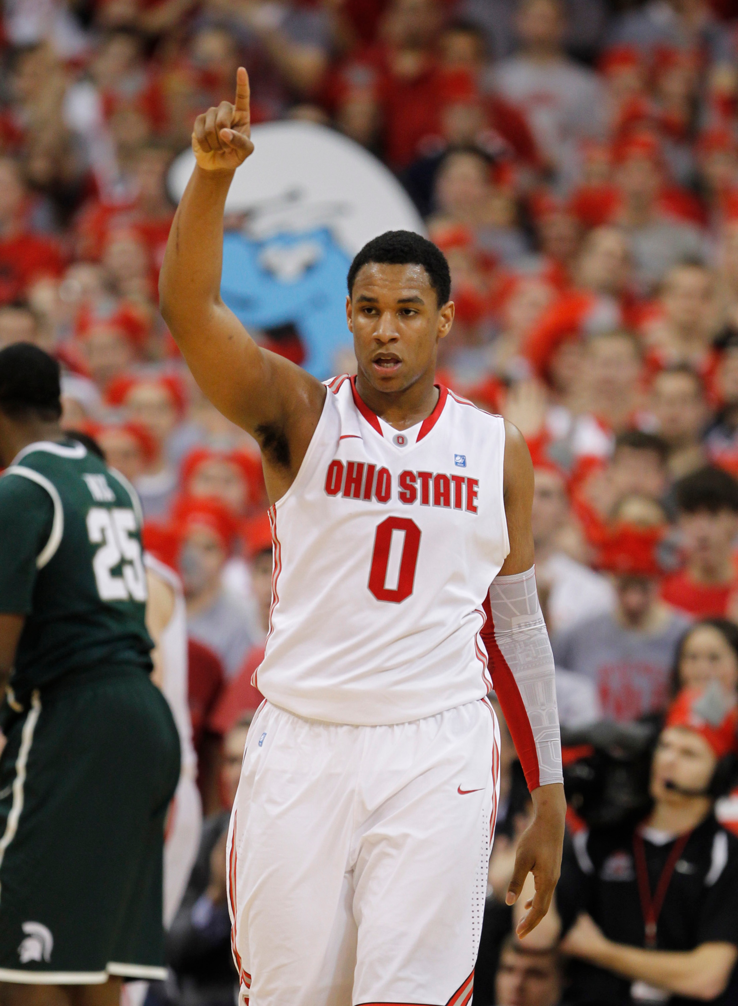 COLUMBUS, OH - FEBRUARY 15:  Jared Sullinger #0 of the Ohio State Buckeyes reacts while playing the Michigan State Spartans on February 15, 2011 at Value City Arena in Columbus, Ohio.  (Photo by Gregory Shamus/Getty Images)