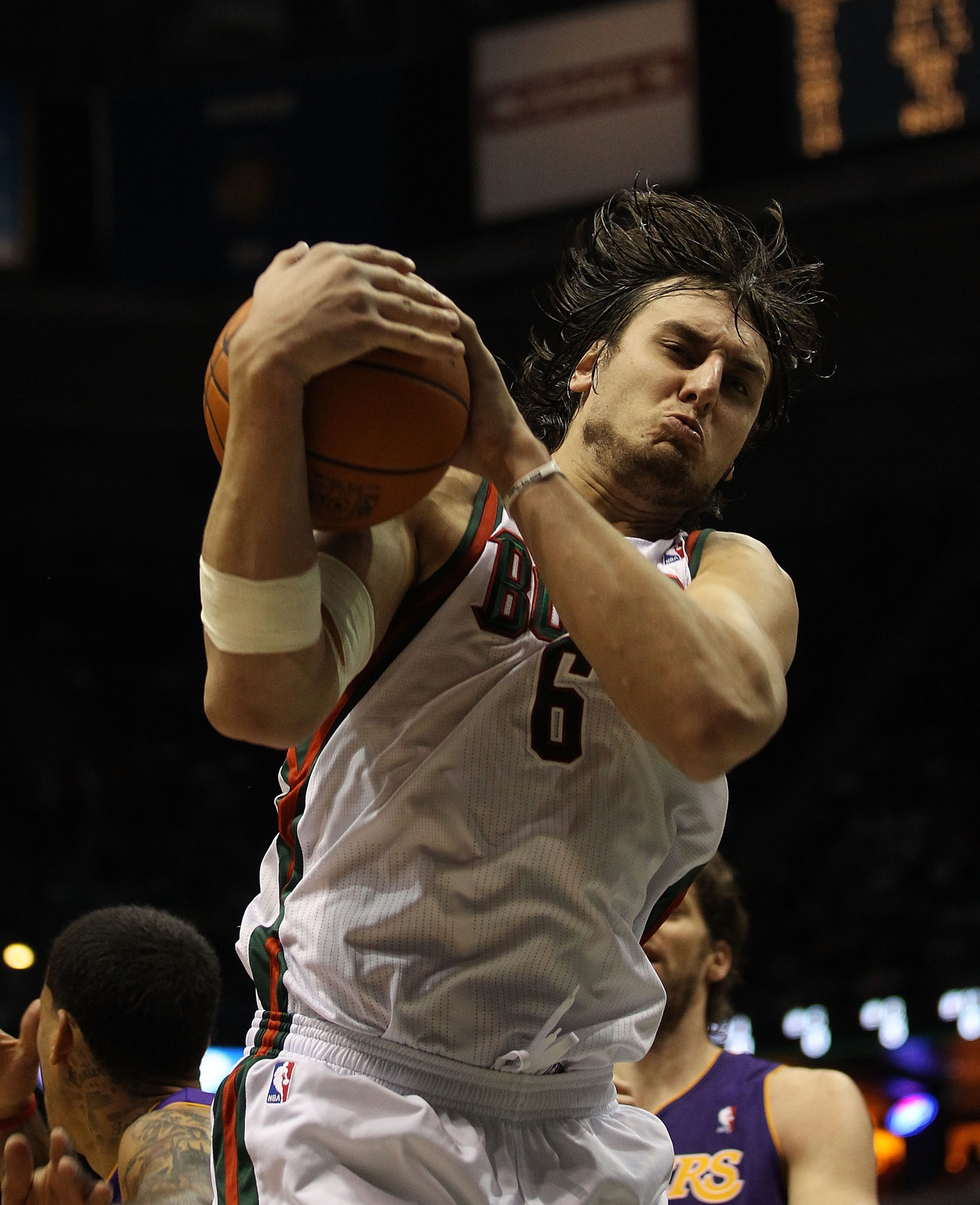 MILWAUKEE - NOVEMBER 16: Andrew Bogut #6 of the Milwaukee Bucks grabs a rebound against the Los Angeles Lakers at the Bradley Center on November 16, 2010 in Milwaukee, Wisconsin. The Lakers defeated the Bucks 118-107. NOTE TO USER: User expressly acknowle MILWAUKEE - NOVEMBER 16: Andrew Bogut #6 of the Milwaukee Bucks grabs a rebound against the Los Angeles Lakers at the Bradley Center on November 16, 2010 in Milwaukee, Wisconsin. The Lakers defeated the Bucks 118-107. NOTE TO USER: User expressly acknowle