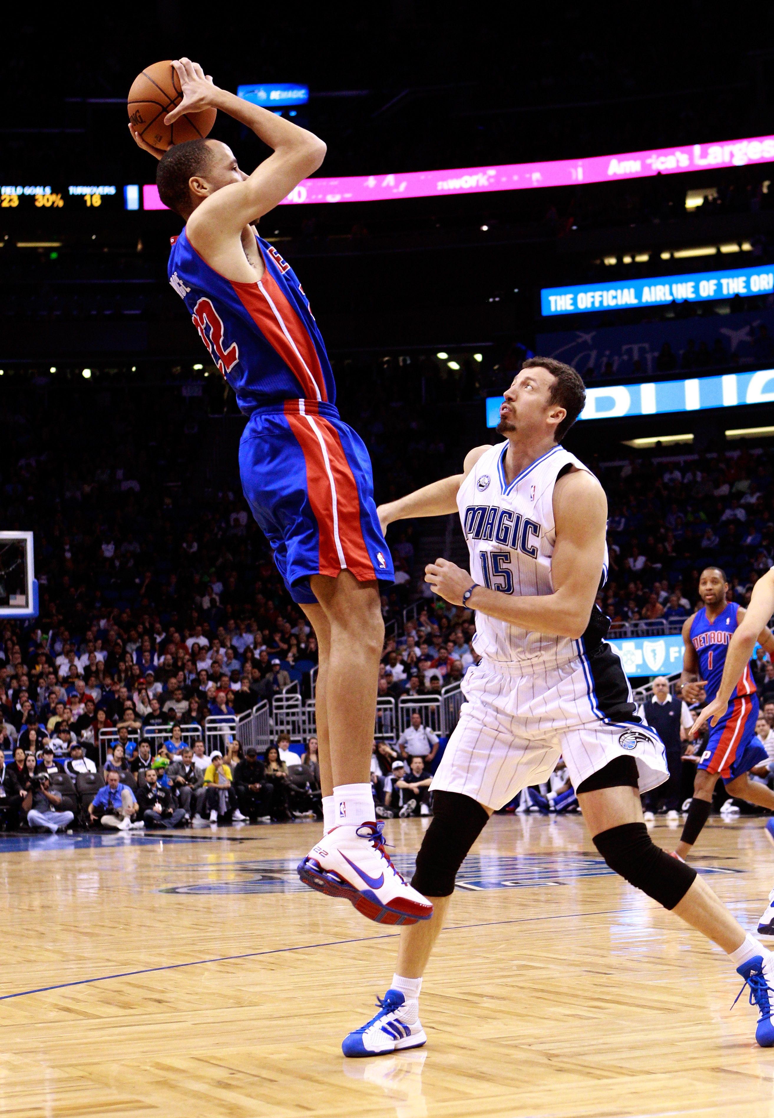 ORLANDO, FL - JANUARY 24:  Tayshaun Prince #22 of the Detroit Pistons attempts a shot over Hedo Turkoglu #15 of the Orlando Magic during the game at Amway Arena on January 24, 2011 in Orlando, Florida.  NOTE TO USER: User expressly acknowledges and agrees