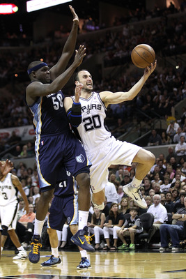 SAN ANTONIO, TX - APRIL 27:  Manu Ginobili #20 of the San Antionio Spurs shoots over Zach Randolph #50 of the Memphis Grizzlies in Game Five of the Western Conference Quarterfinals in the 2011 NBA Playoffs on April 27, 2011 at AT&T Center in San Antonio,