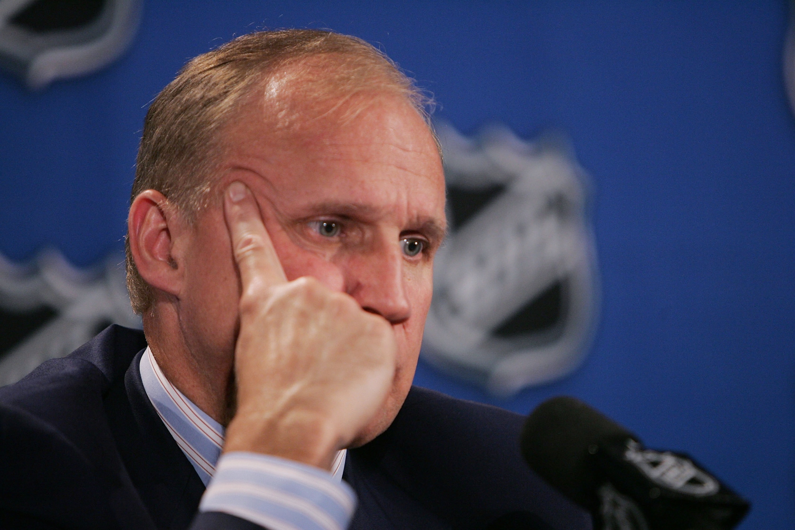 NEW YORK - JULY 22:  Colin Campbell, Executive Vice President and Director of Hockey Operations for the National Hockey League, addresses the media during a press conference explaning the NHL rule changes at the Sheraton New York Hotel and Towers on July