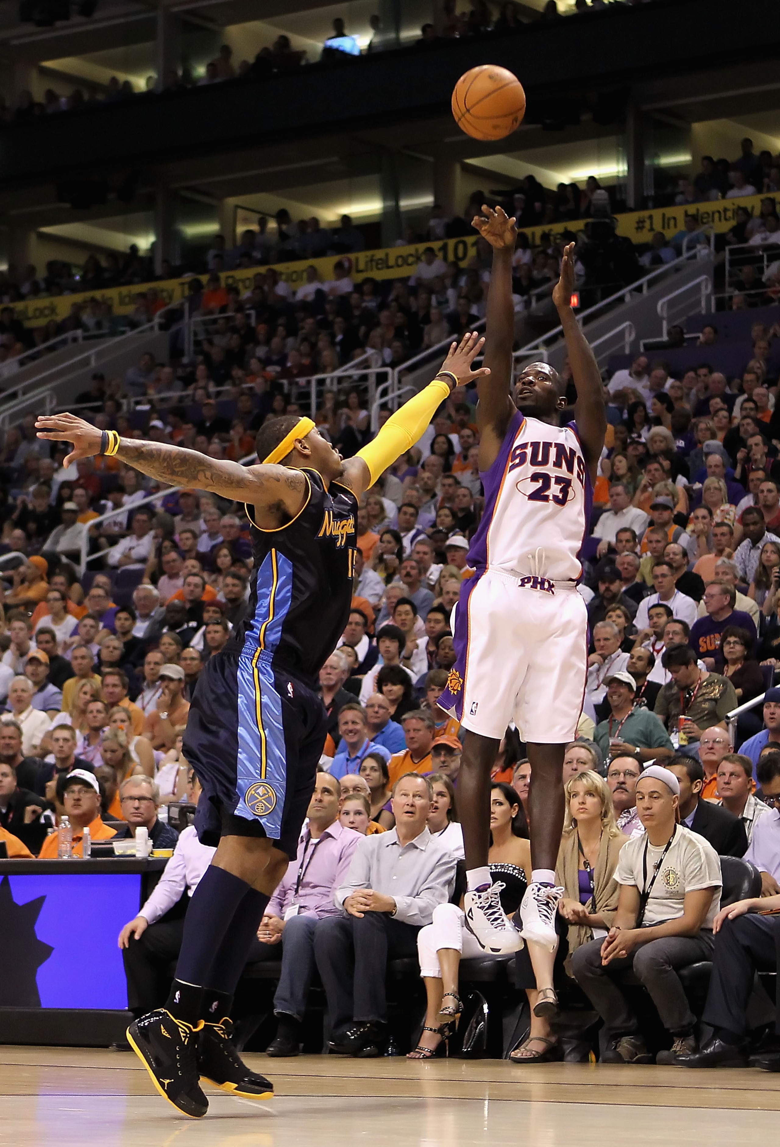 PHOENIX - APRIL 13: Jason Richardson #23 of the Phoenix Suns puts up a shot over Carmelo Anthony #15 of the Denver Nuggets during the NBA game at US Airways Center on April 13, 2010 in Phoenix, Arizona. NOTE TO USER: User expressly acknowledges and agree PHOENIX - APRIL 13: Jason Richardson #23 of the Phoenix Suns puts up a shot over Carmelo Anthony #15 of the Denver Nuggets during the NBA game at US Airways Center on April 13, 2010 in Phoenix, Arizona. NOTE TO USER: User expressly acknowledges and agree