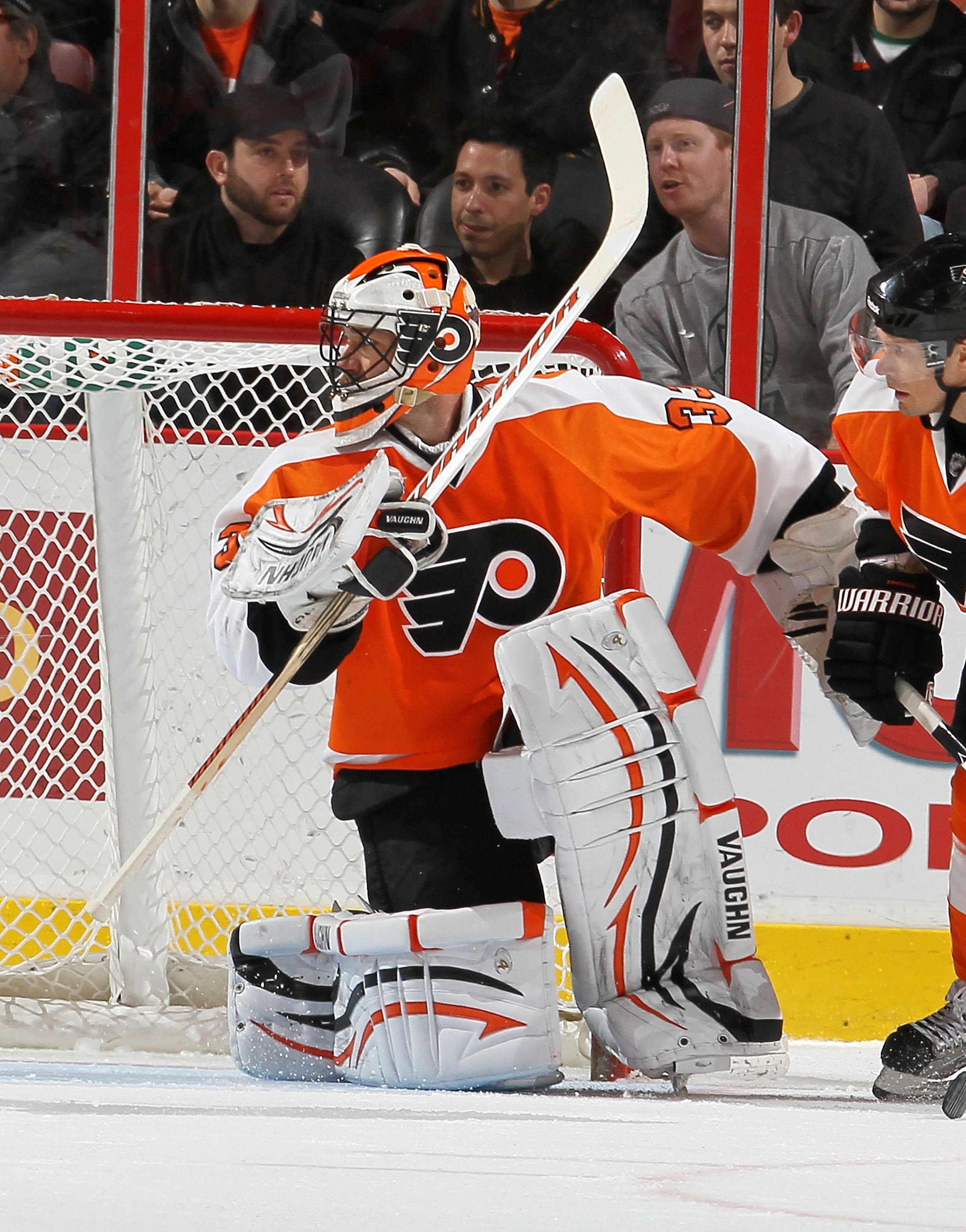 Philadelphia Flyers goalie Brian Boucher watches the reply and
