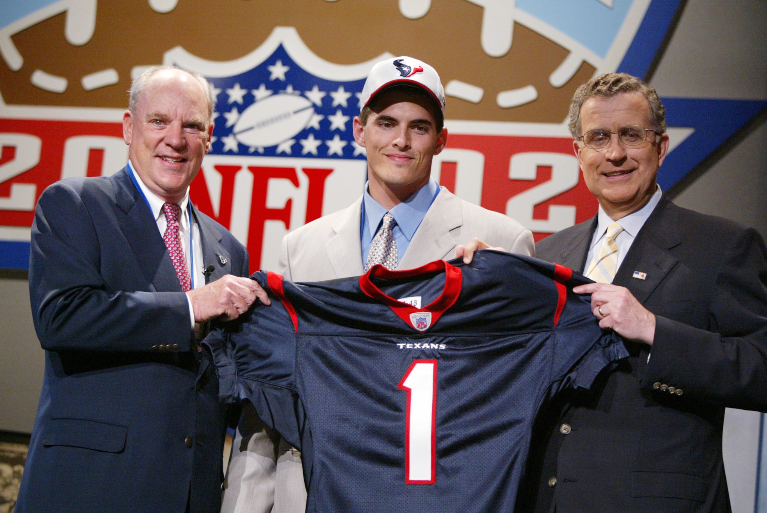 20 April 2002: David Carr of Fresno State poses with Houston Texans Owner Robert McNair (Left) and NFL Commisioner Paul Tagliabue after Carr was selected as the first pick in the 2002 NFL Draft at the Theatre in Madison Square Garden in New York City, Ne 20 April 2002: David Carr of Fresno State poses with Houston Texans Owner Robert McNair (Left) and NFL Commisioner Paul Tagliabue after Carr was selected as the first pick in the 2002 NFL Draft at the Theatre in Madison Square Garden in New York City, Ne