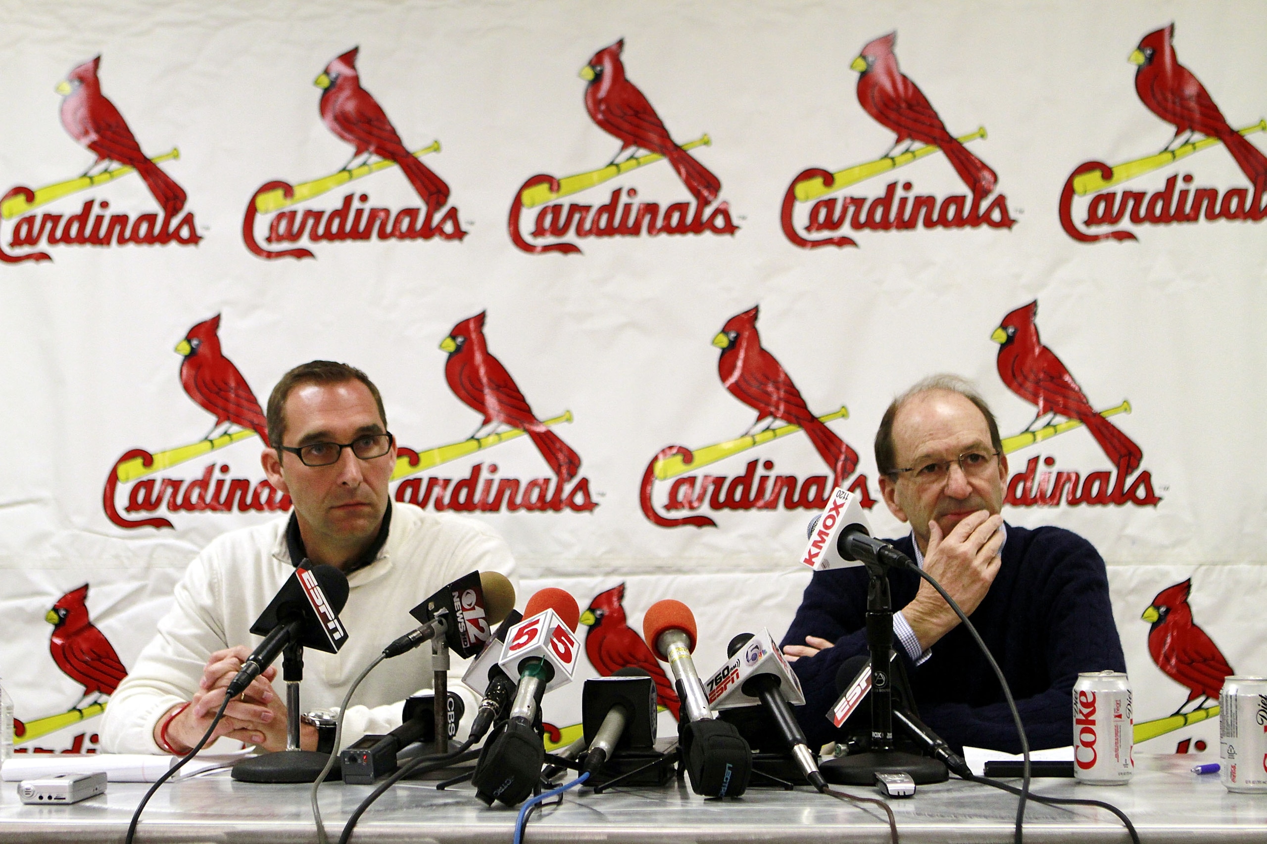 JUPITER, FL - FEBRUARY 16:  General Manager John Mozeliak (L) and owner William DeWitt, Jr. of the St. Louis Cardinals speak at a press conference at Roger Dean Stadium on February 16, 2011 in Jupiter, Florida.  (Photo by Marc Serota/Getty Images)