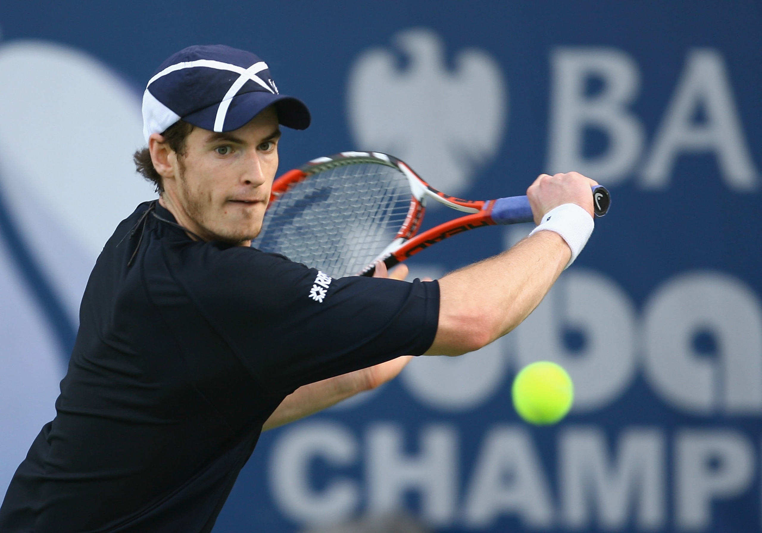 DUBAI, UNITED ARAB EMIRATES - MARCH 06:  Andy Murray of Great Britain plays a backhand against Nikolay Davydenko of Russia during the ATP Barclays Dubai Tennis Championships at the Dubai Tennis Stadium on March 6, 2008 in Dubai, United Arab Emirates.  (Ph