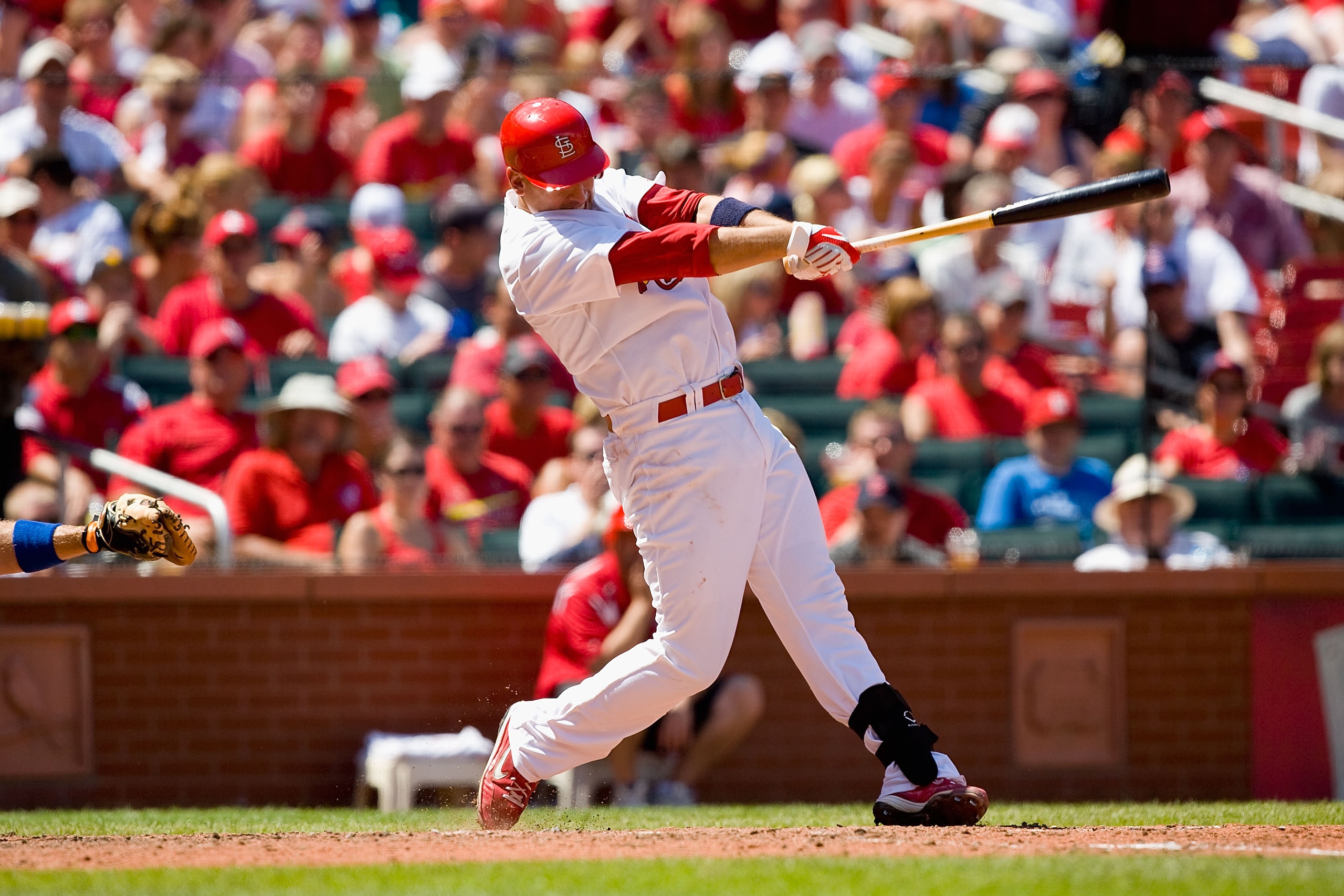 ST. LOUIS - JULY 18: Allen Craig #8 of the St. Louis Cardinals in action against the Los Angeles Dodgers at Busch Stadium on July 18, 2010 in St. Louis, Missouri.  (Photo by Dilip Vishwanat/Getty Images)
