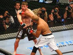 BJ Penn lands a solid right hand to KO Matt Hughes