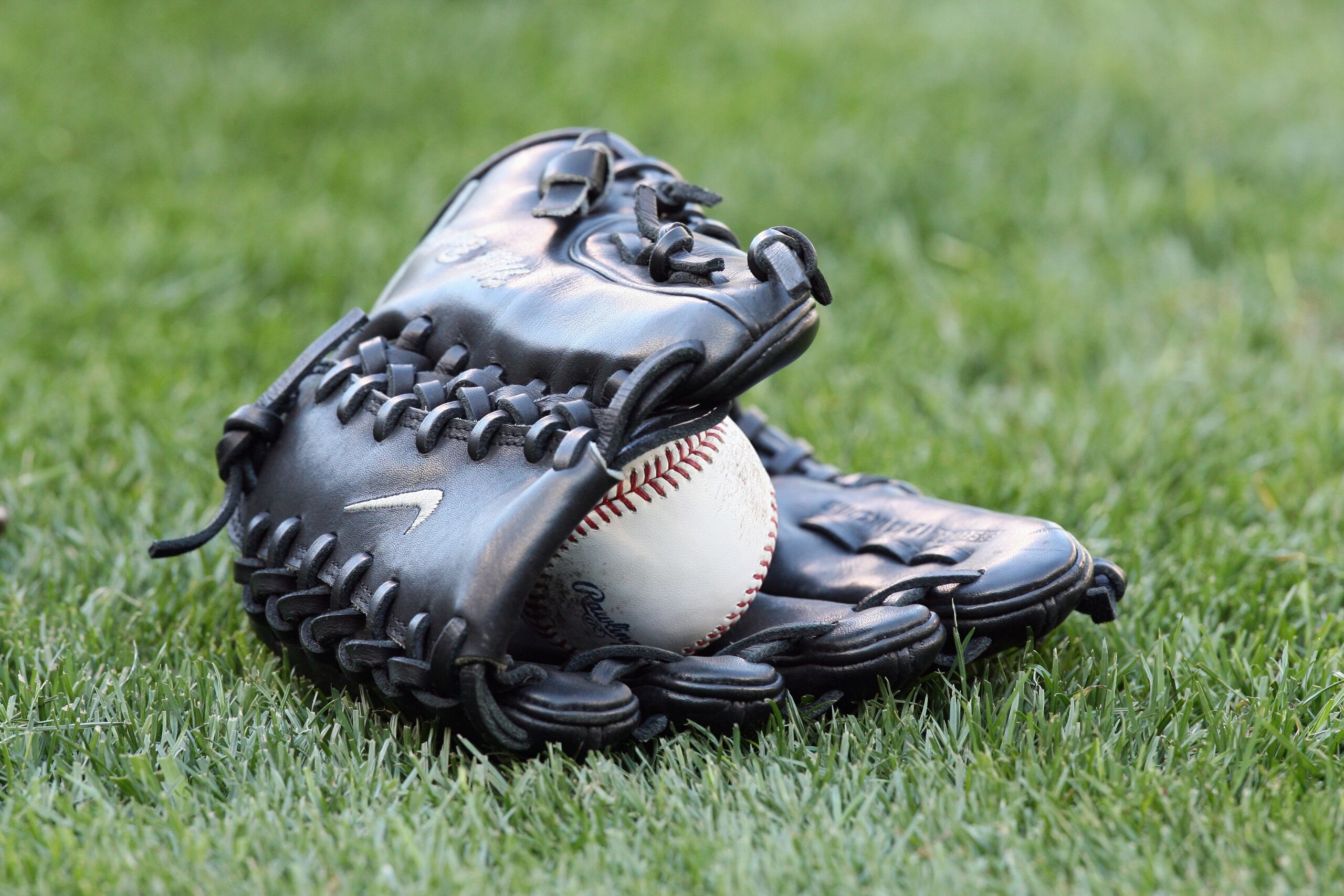 SEATTLE - AUGUST 12:  Detail view of Mark Buehrle's glove with ball is shown before the Chicago White Sox game against the Seattle Mariners on August 12, 2009 at Safeco Field in Seattle, Washington. (Photo by Otto Greule Jr/Getty Images)