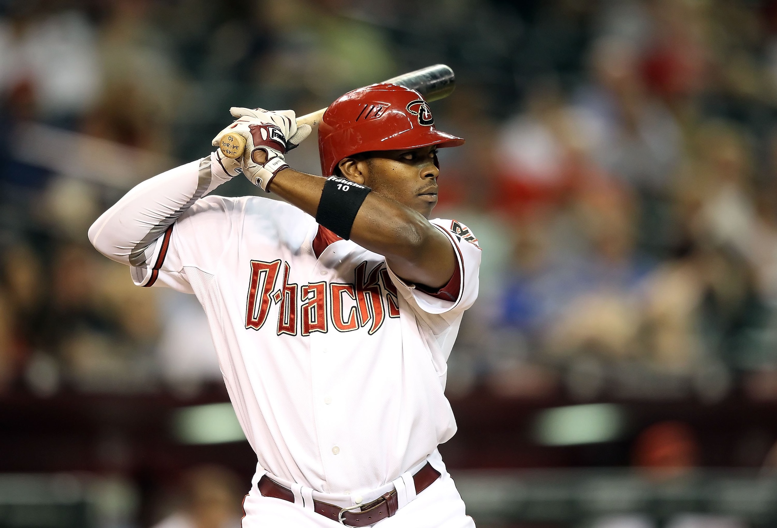 PHOENIX - JUNE 11:  Justin Upton #10 of the Arizona Diamondbacks bats against the St. Louis Cardinals during the Major League Baseball game at Chase Field on June 11, 2010 in Phoenix, Arizona. The Cardinals defeated the Diamondbacks 5-2.  (Photo by Christ
