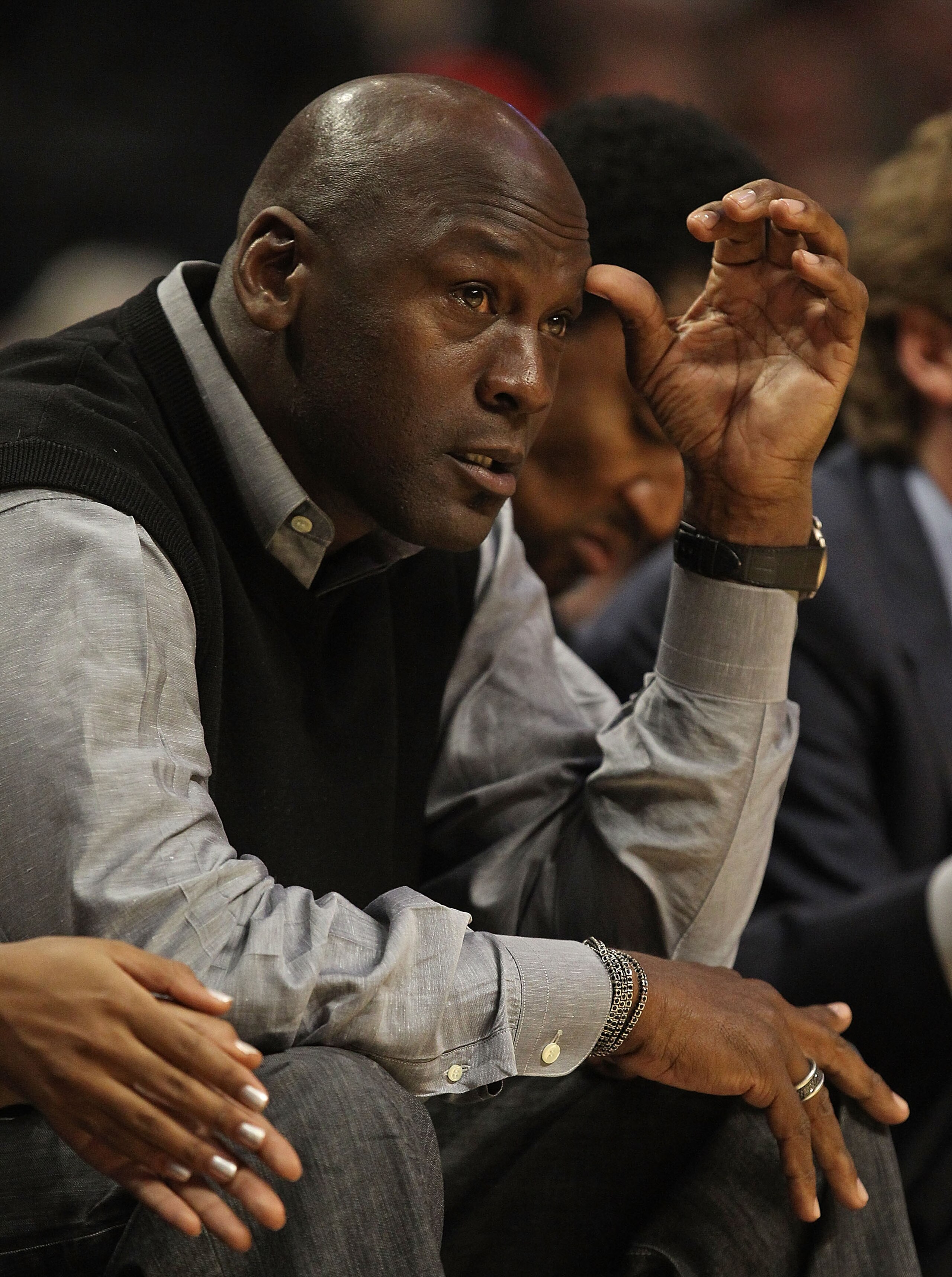 CHICAGO, IL - FEBRUARY 15: Former player Michael Jordan of the Chicago Bulls watches a game between the Bulls and the Charlotte Bobcats at the United Center on February 15, 2011 in Chicago, Illinois. The Bulls defeated the Bobcats 106-94. NOTE TO USER: Us