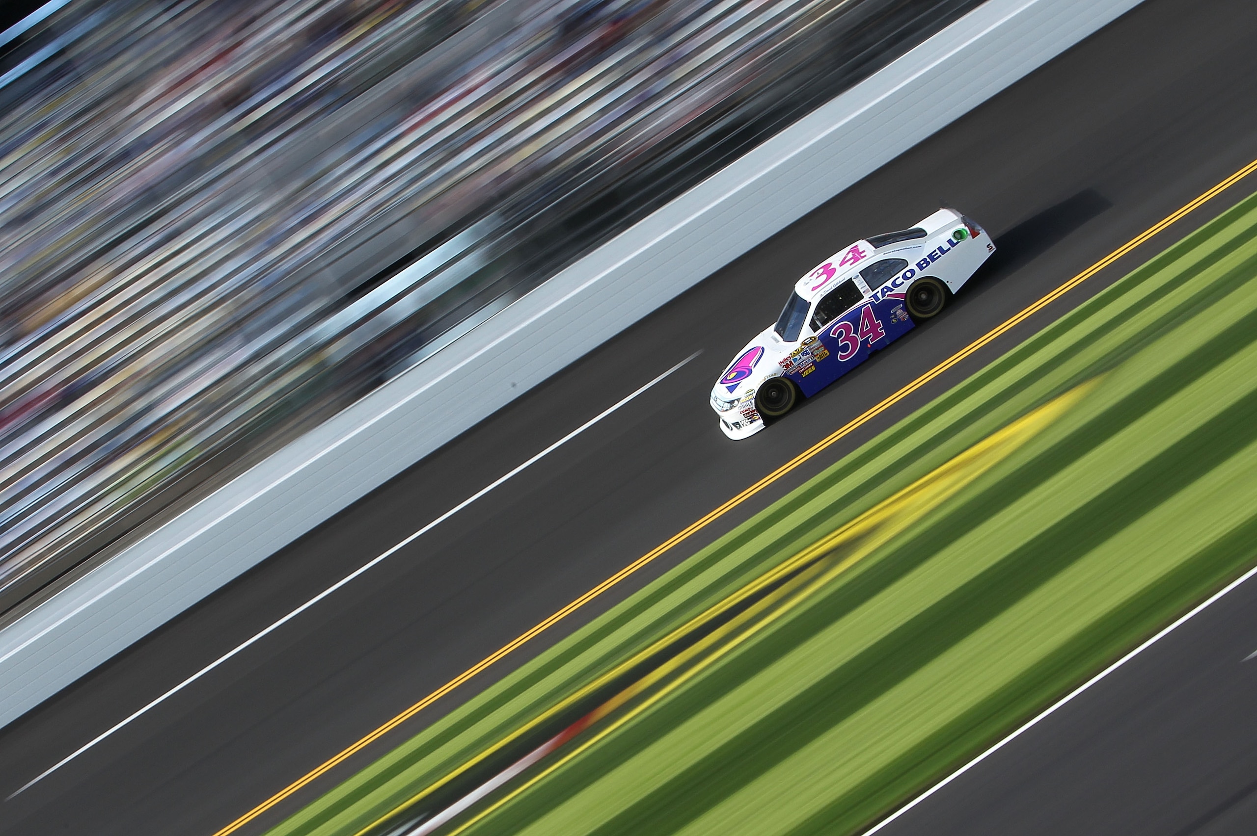 DAYTONA BEACH, FL - FEBRUARY 12: David Gilliland, driver of the #34 Taco Bell Ford, practices for the NASCAR Sprint Cup Series Daytona 500 at Daytona International Speedway on February 12, 2011 in Daytona Beach, Florida. (Photo by Nick Laham/Getty Image DAYTONA BEACH, FL - FEBRUARY 12: David Gilliland, driver of the #34 Taco Bell Ford, practices for the NASCAR Sprint Cup Series Daytona 500 at Daytona International Speedway on February 12, 2011 in Daytona Beach, Florida. (Photo by Nick Laham/Getty Image