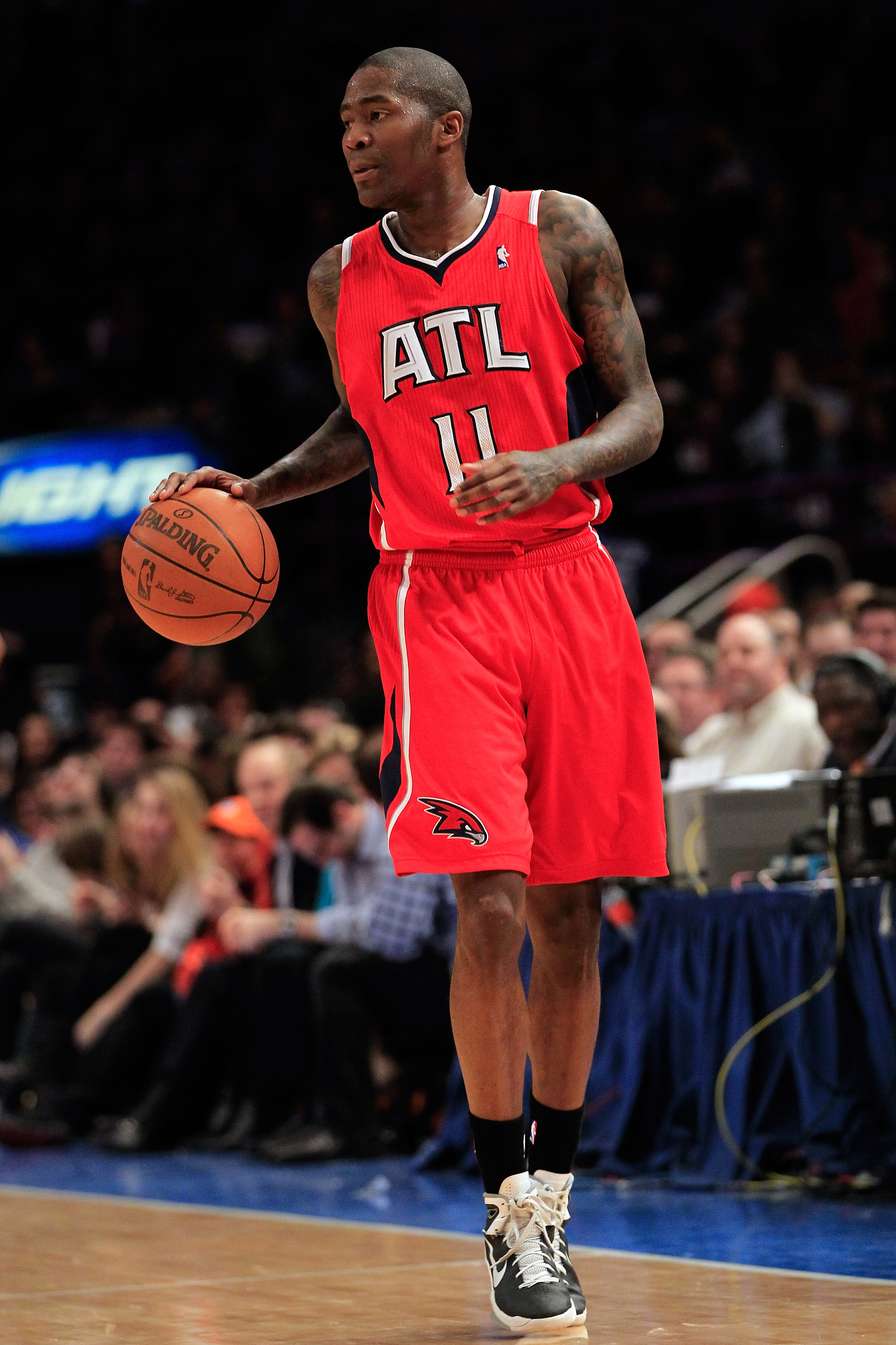 NEW YORK, NY - FEBRUARY 16: Jamal Crawford #11 of the Atlanta Hawks dribbles the ball against the New York Knicks at Madison Square Garden on February 16, 2011 in New York City. NOTE TO USER: User expressly acknowledges and agrees that, by downloading and