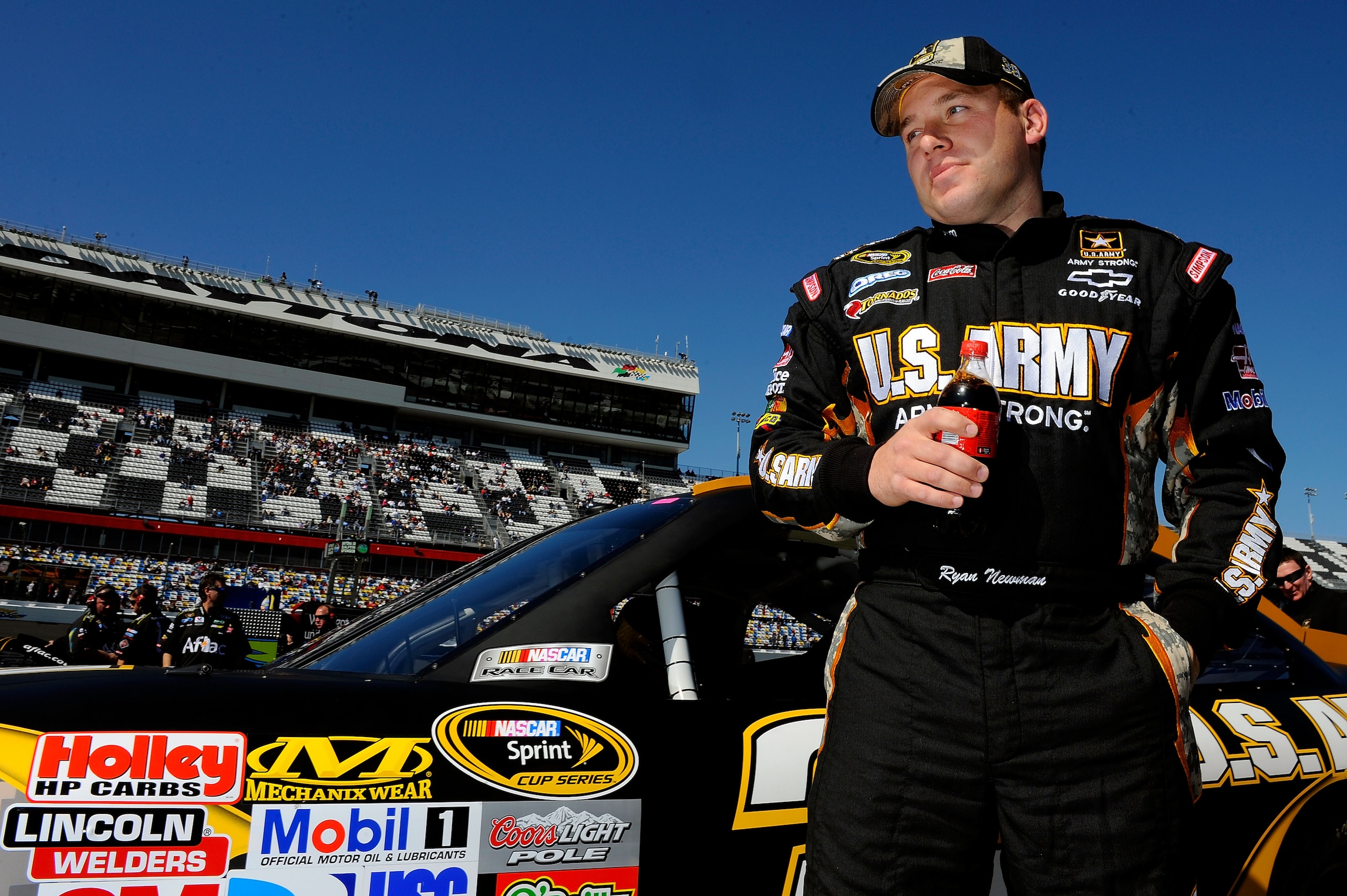 DAYTONA BEACH, FL - FEBRUARY 13: Ryan Newman, driver of the #39 U.S. Army Chevrolet, stands on the grid during qualifying for the NASCAR Sprint Cup Series Daytona 500 at Daytona International Speedway on February 13, 2011 in Daytona Beach, Florida. (Pho DAYTONA BEACH, FL - FEBRUARY 13: Ryan Newman, driver of the #39 U.S. Army Chevrolet, stands on the grid during qualifying for the NASCAR Sprint Cup Series Daytona 500 at Daytona International Speedway on February 13, 2011 in Daytona Beach, Florida. (Pho