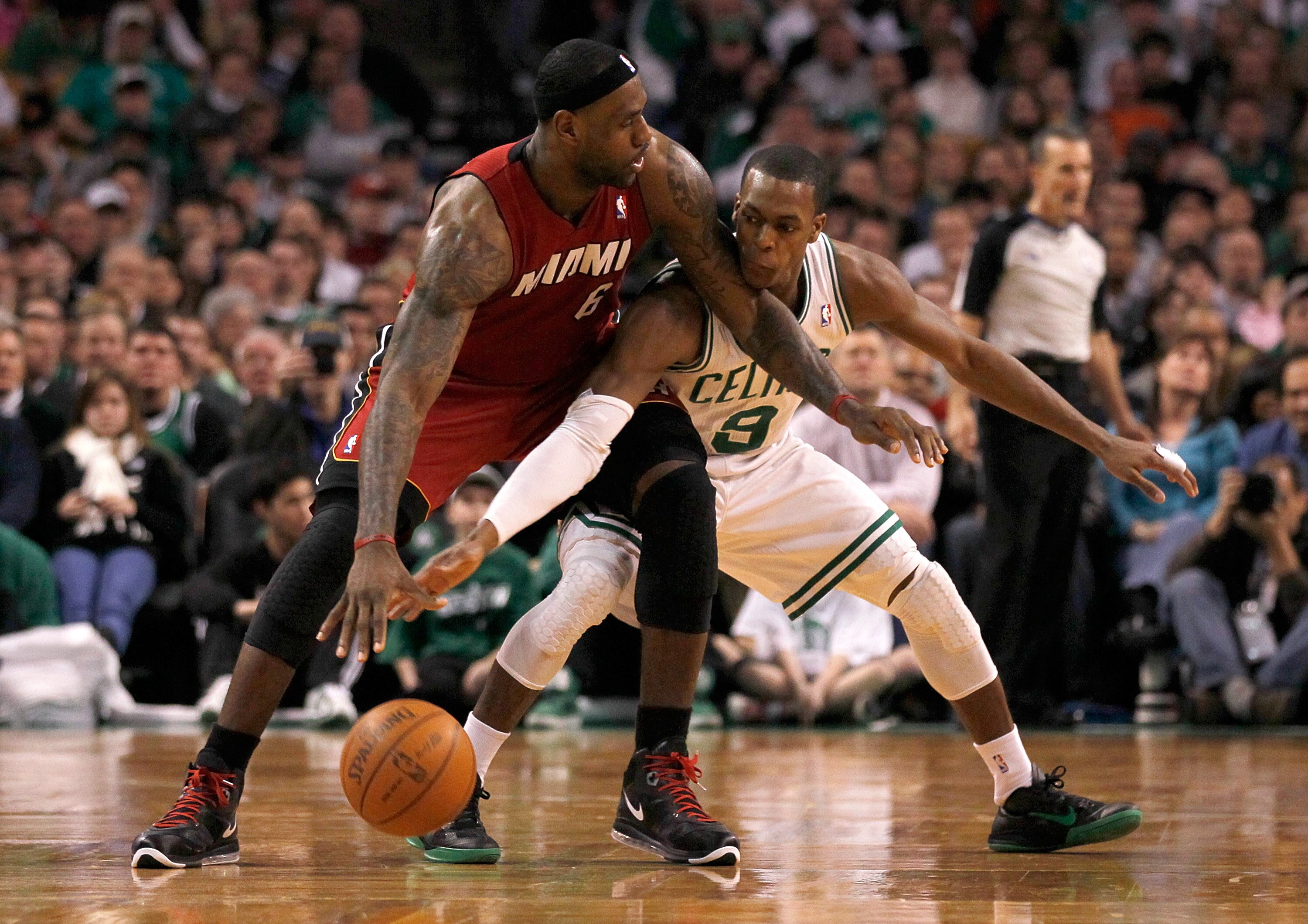 BOSTON - FEBRUARY 13:  LeBron James #6 of the Miami Heat battles Rajon Rondo #9 of the Boston Celtics for control of the ball at TD Garden on February 13, 2011 in Boston, Massachusetts. NOTE TO USER: User expressly acknowledges and agrees that, by downloa