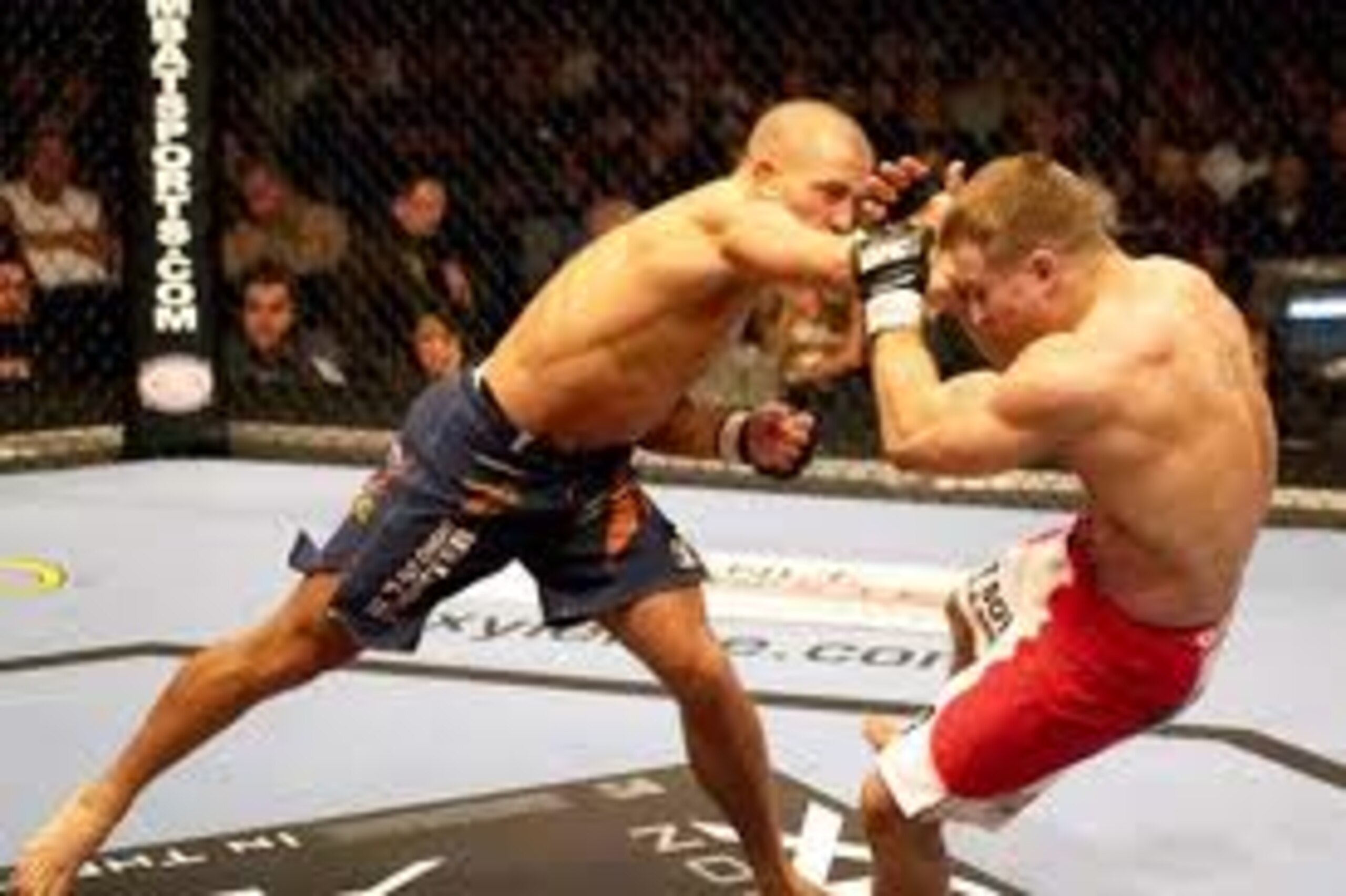 GSP delivering a solid right hand to Sean Sherk GSP delivering a solid right hand to Sean Sherk
