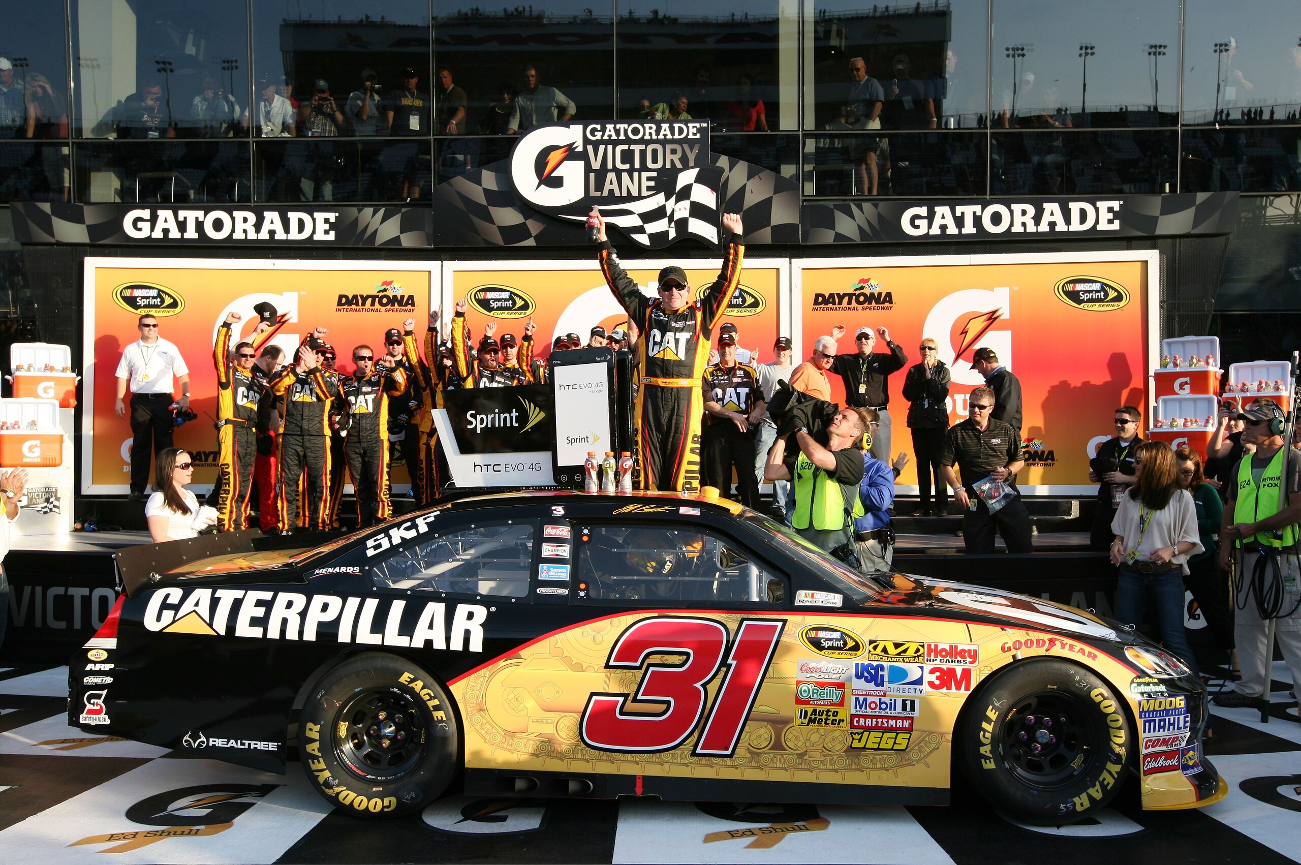 DAYTONA BEACH, FL - FEBRUARY 17: Jeff Burton, driver of the #31 Caterpillar Chevrolet, celebrates in Victory Lane after winning the second race of the NASCAR Sprint Cup Series Gatorade Duel at Daytona International Speedway on February 17, 2011 in Dayton DAYTONA BEACH, FL - FEBRUARY 17: Jeff Burton, driver of the #31 Caterpillar Chevrolet, celebrates in Victory Lane after winning the second race of the NASCAR Sprint Cup Series Gatorade Duel at Daytona International Speedway on February 17, 2011 in Dayton