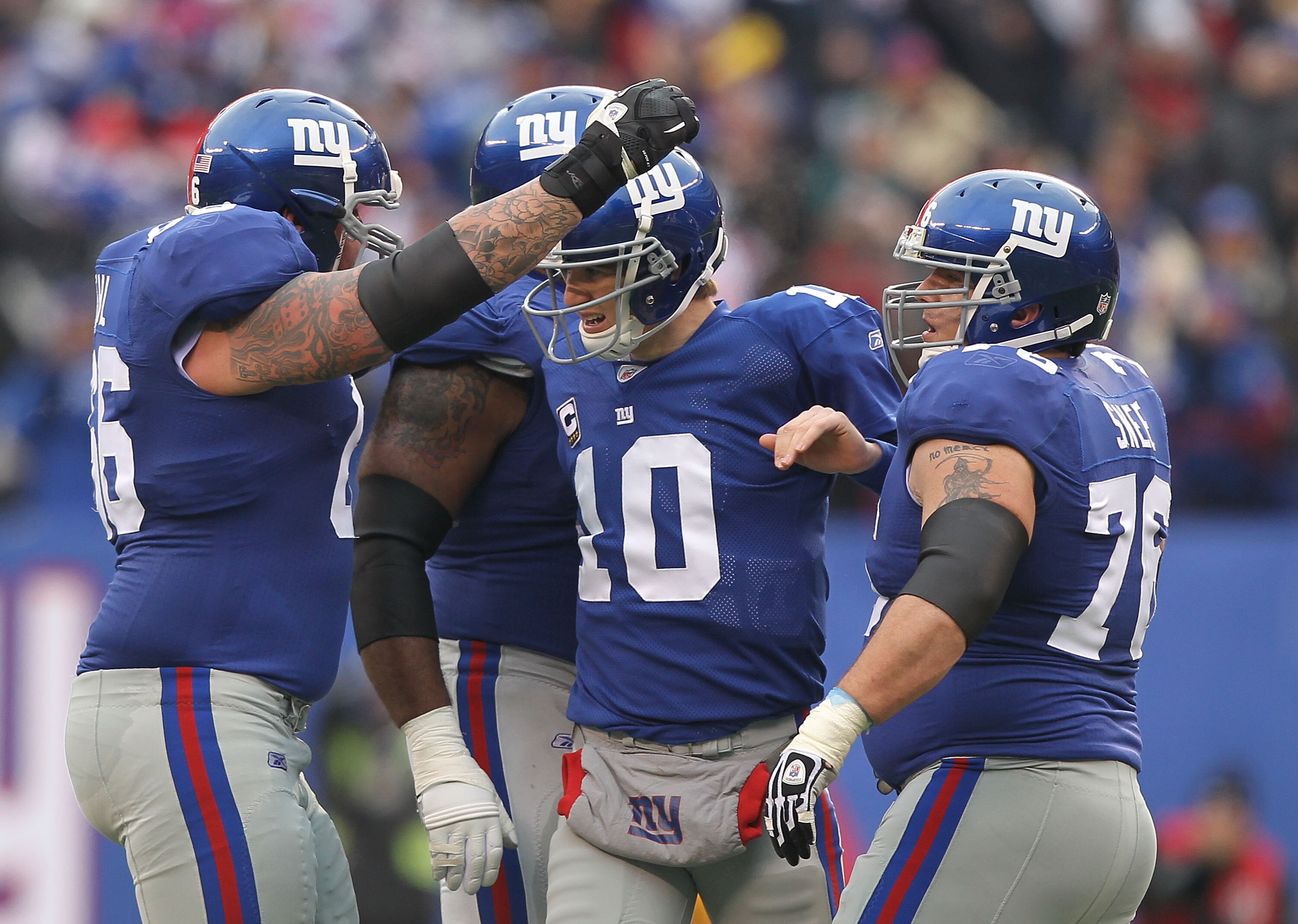 EAST RUTHERFORD, NJ - DECEMBER 19: Eli Manning #10 of the New York Giants celebrates a touchdown by Mario Manningham against  the Philadelphia Eagles during their game on December 19, 2010 at The New Meadowlands Stadium in East Rutherford, New Jersey.  (P