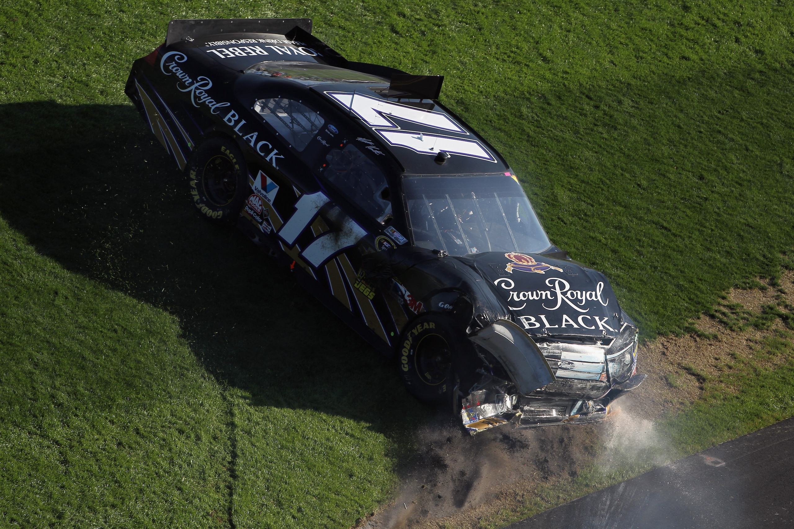 DAYTONA BEACH, FL - FEBRUARY 20: Matt Kenseth, driver of the #17 Crown Royal Black Ford, spins off the track into the infield during the NASCAR Sprint Cup Series Daytona 500 at Daytona International Speedway on February 20, 2011 in Daytona Beach, Florida DAYTONA BEACH, FL - FEBRUARY 20: Matt Kenseth, driver of the #17 Crown Royal Black Ford, spins off the track into the infield during the NASCAR Sprint Cup Series Daytona 500 at Daytona International Speedway on February 20, 2011 in Daytona Beach, Florida