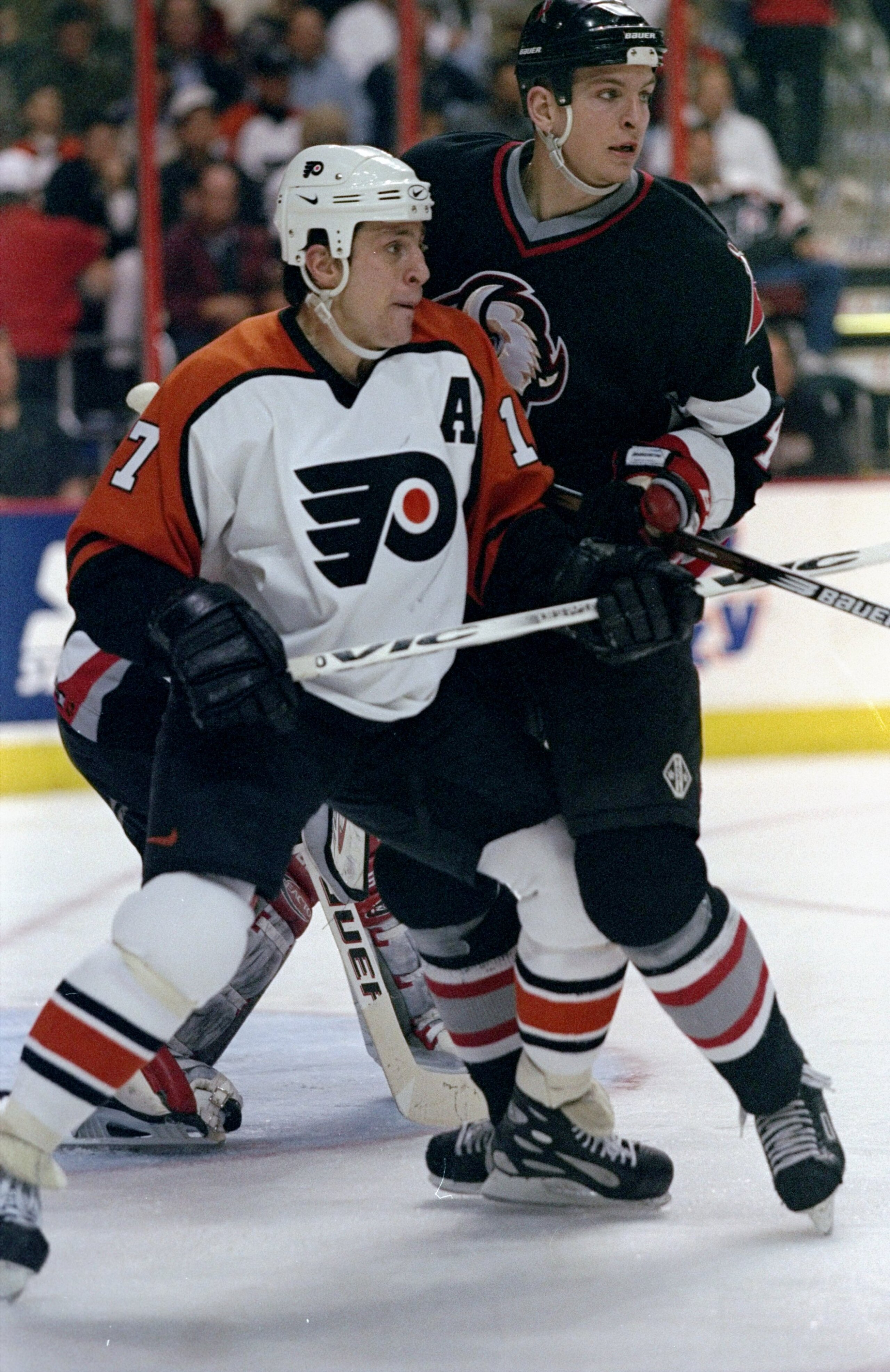 22 Apr 1998:  Left wing Rod Brind''Amour of the Philadelphia Flyers and defenseman Mike Wilson of the Buffalo Sabres in action during a game at the Corestates Center in Philadelphia, Pennsylvania. The Sabres defeated the Flyers 3-2. Mandatory Credit: Crai