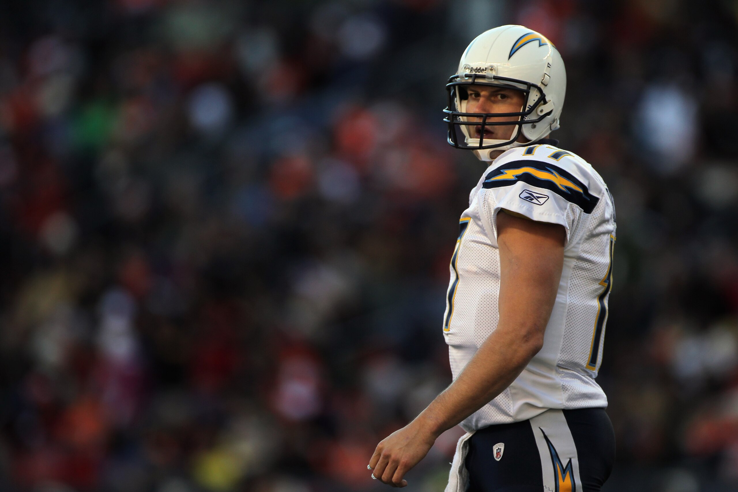 DENVER - JANUARY 02:  Quarterback Philip Rivers #17 of the San Diego Chargers takes the field against the Denver Broncos at INVESCO Field at Mile High on January 2, 2011 in Denver, Colorado. The Chargers defeated the Broncos 33-28.  (Photo by Doug Pensing