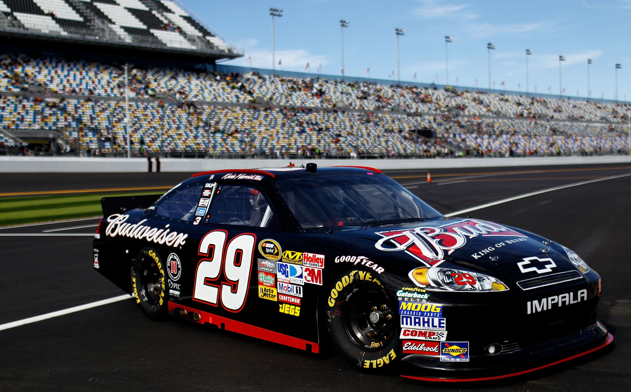 DAYTONA BEACH, FL - FEBRUARY 12: Kevin Harvick, driver of the #29 Budweiser Chevrolet, drives off pit road during practice for the NASCAR Sprint Cup Series Daytona 500 at Daytona International Speedway on February 12, 2011 in Daytona Beach, Florida. (Ph DAYTONA BEACH, FL - FEBRUARY 12: Kevin Harvick, driver of the #29 Budweiser Chevrolet, drives off pit road during practice for the NASCAR Sprint Cup Series Daytona 500 at Daytona International Speedway on February 12, 2011 in Daytona Beach, Florida. (Ph