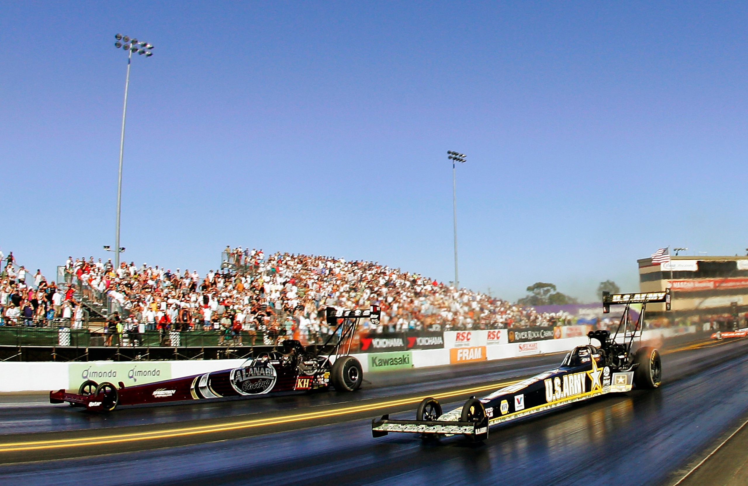 SONOMA, CA - JULY 18:  Larry Dixon gets out ahead of Tony Schumacher to win the Top Fuel final during the FRAM-Autolite NHRA Nationals on July 18, 2010 at Infineon Raceway in Sonoma, California.  (Photo by Brian Bahr/Getty Images for Infineon Raceway)