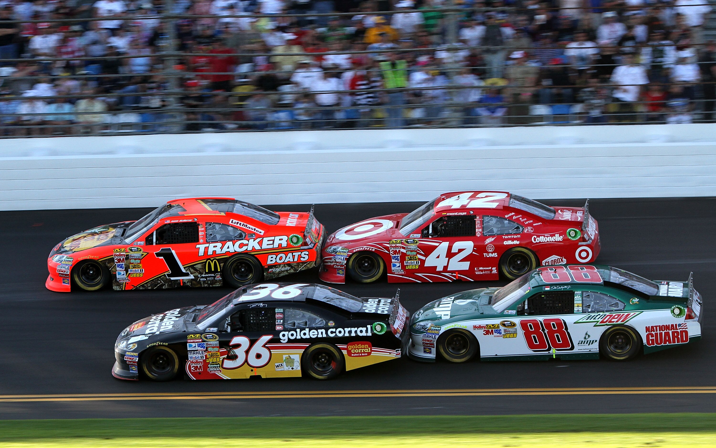 DAYTONA BEACH, FL - FEBRUARY 20:  Jamie McMurray, driver of the #1 Bass Pro Shops Chevrolet, Juan Pablo Montoya, driver of the #42 Target Chevrolet, Dave Blaney, driver of the #36 Tommy Baldwin Racing Chevrolet,  and Dale Earnhardt Jr., driver of the #88