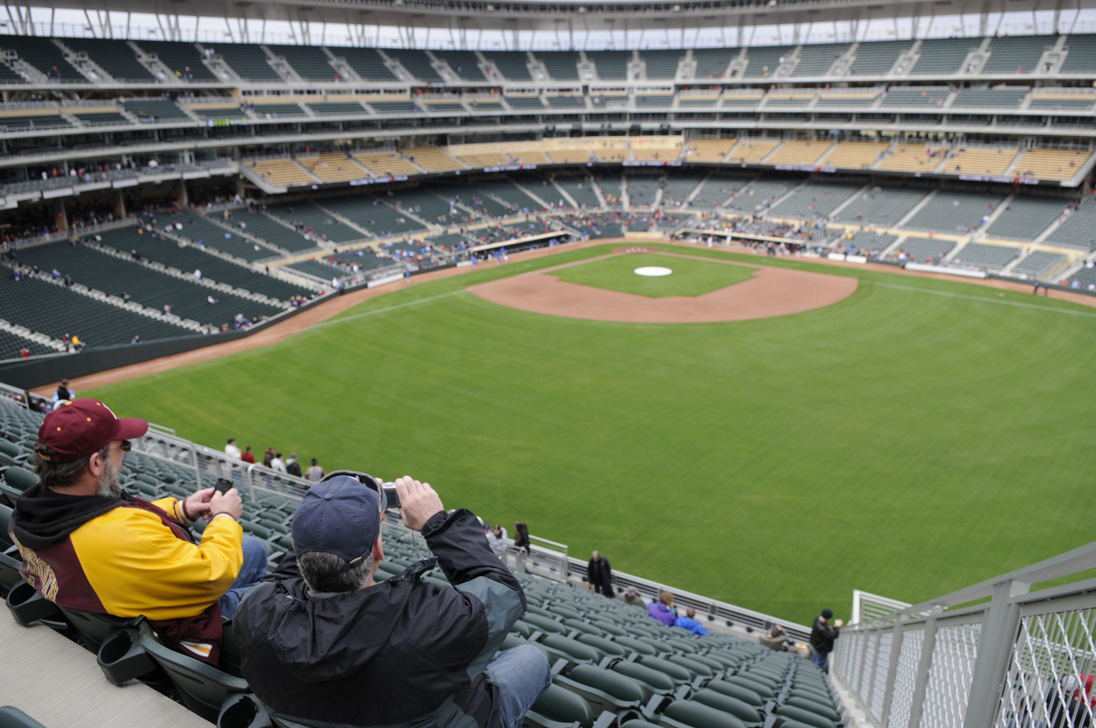 MINNEAPOLIS, MN - MARCH 27: Fans sit in the grandstand seats above right field before an exhibition game between the Minnesota Golden Gophers and the Louisiana Tech Bulldogs at Target Field on March 27, 2010 in Minneapolis, Minnesota. (Photo by Hannah Fos