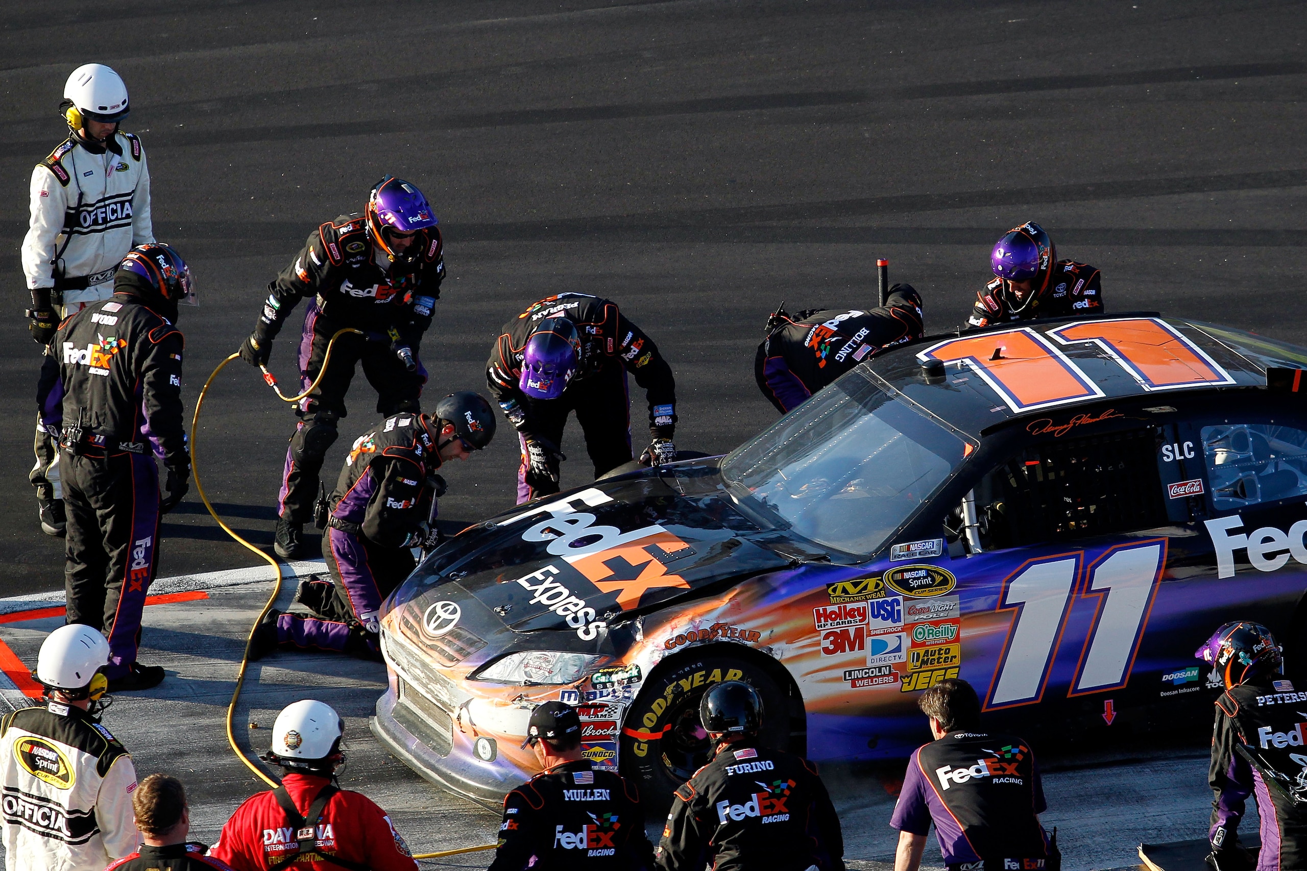 DAYTONA BEACH, FL - FEBRUARY 20: Denny Hamlin pits the #11 FedEx Toyota during the NASCAR Sprint Cup Series Daytona 500 at Daytona International Speedway on February 20, 2011 in Daytona Beach, Florida. (Photo by Todd Warshaw/Getty Images for NASCAR) DAYTONA BEACH, FL - FEBRUARY 20: Denny Hamlin pits the #11 FedEx Toyota during the NASCAR Sprint Cup Series Daytona 500 at Daytona International Speedway on February 20, 2011 in Daytona Beach, Florida. (Photo by Todd Warshaw/Getty Images for NASCAR)
