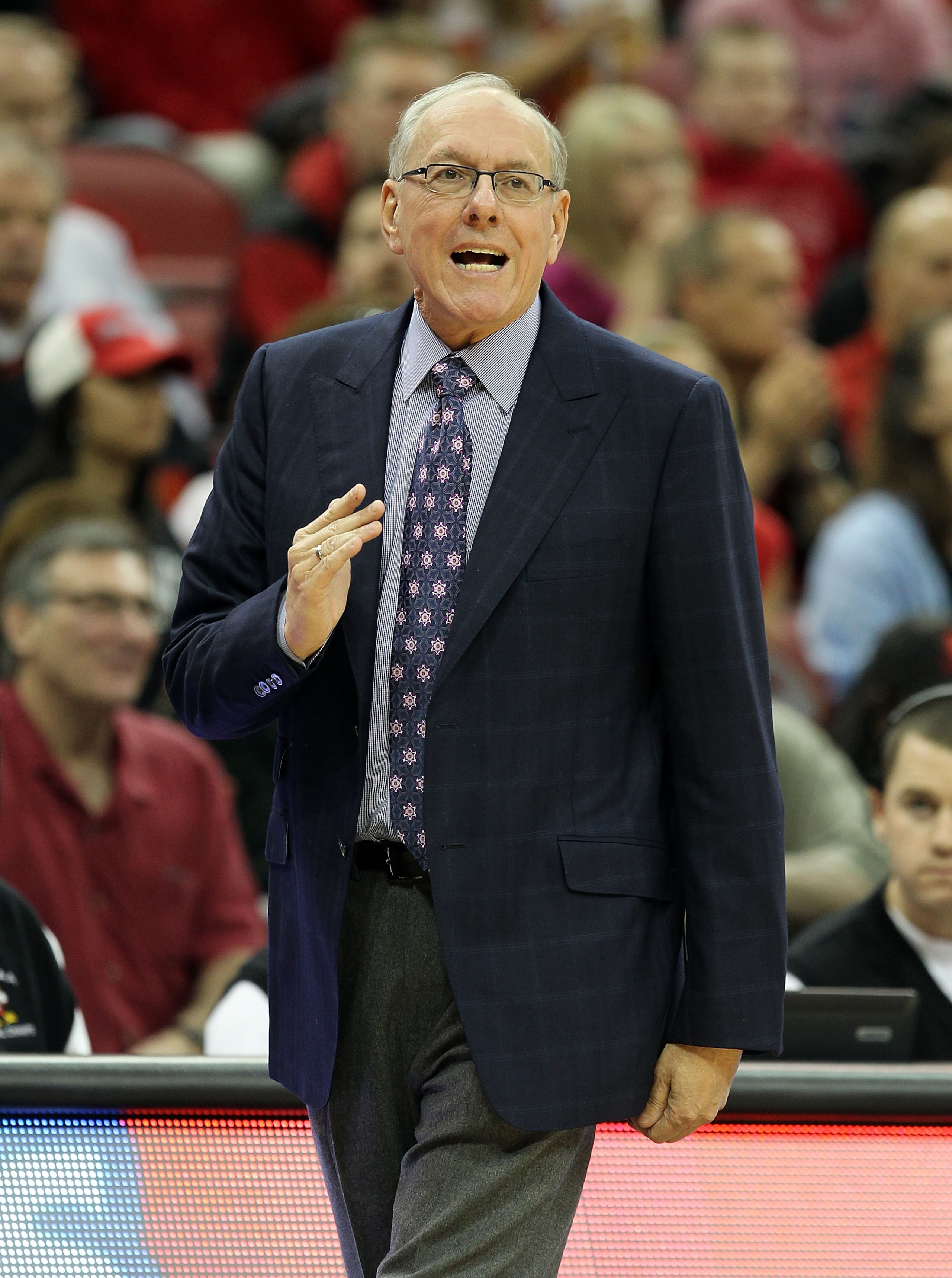 LOUISVILLE, KY - FEBRUARY 12:  Jim Boeheim the Head Coach of the Syracuse Orange gives instructions to his team during the Big East Conference game against the Louisville Cardinals at the KFC Yum! Center on February 12, 2011 in Louisville, Kentucky.  Loui