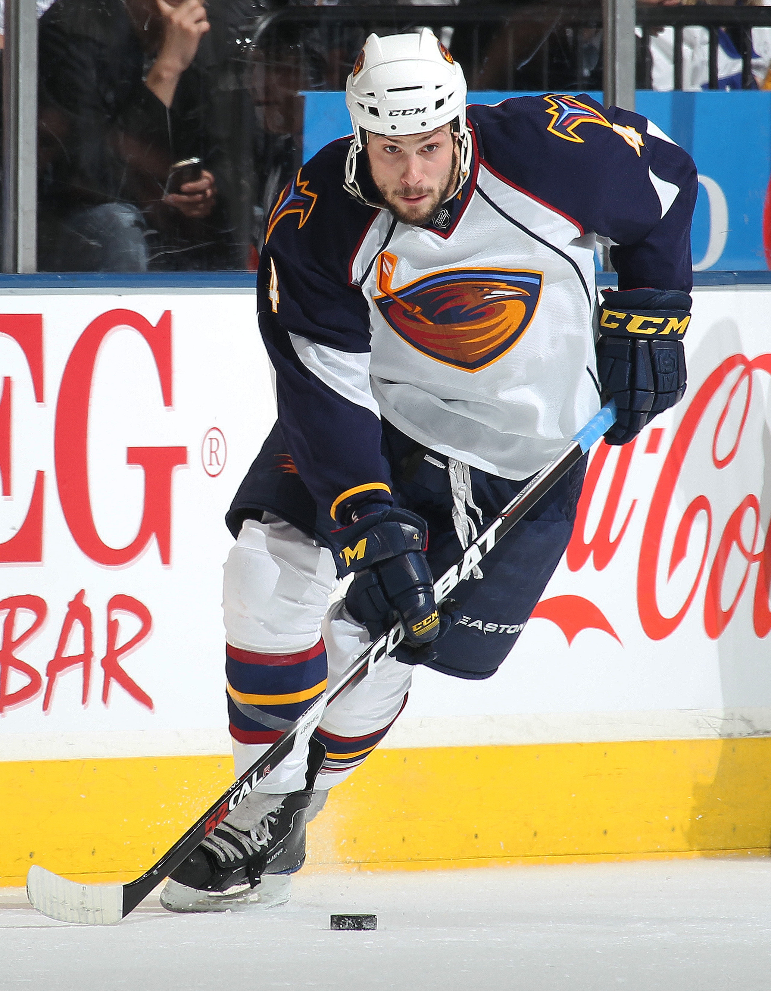 TORONTO, CAN - FEBRUARY 7:  Zach Bogosian #4 of the Atlanta Thrashers skates with the puck in a game against the Toronto Maple Leafs on February 7, 2011 at the Air Canada Centre in Toronto, Canada. The Leafs defeated the Thrashers 5-4. (Photo by Claus And