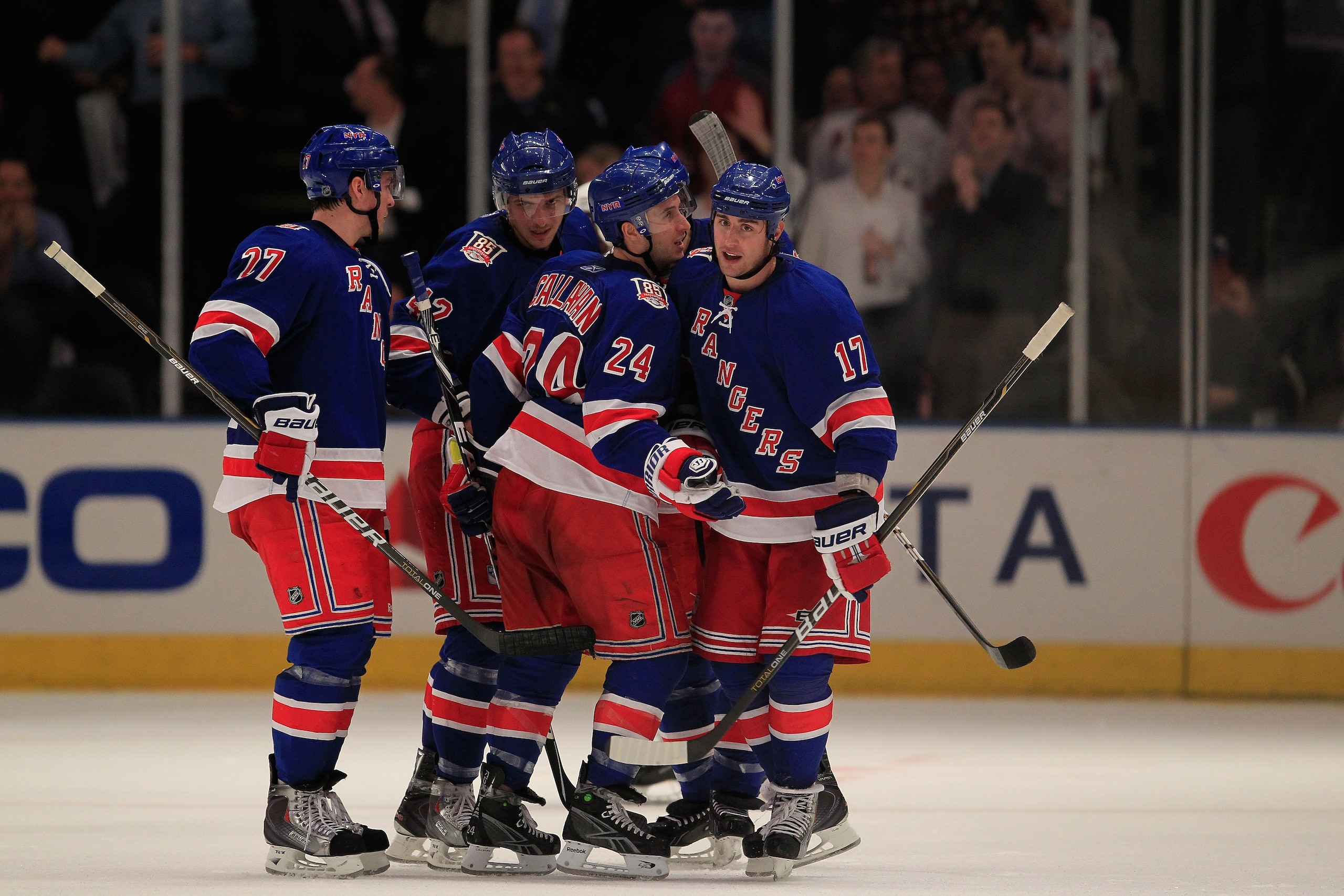 NEW YORK, NY - FEBRUARY 17:  Brandon Dubinsky #17 of the New York Rangers is congratulated by his teammates for his goal in the third period against the Los Angeles Kings on February 17, 2011 in New York City. The Rangers defeated the Kings 4-3 after a sh
