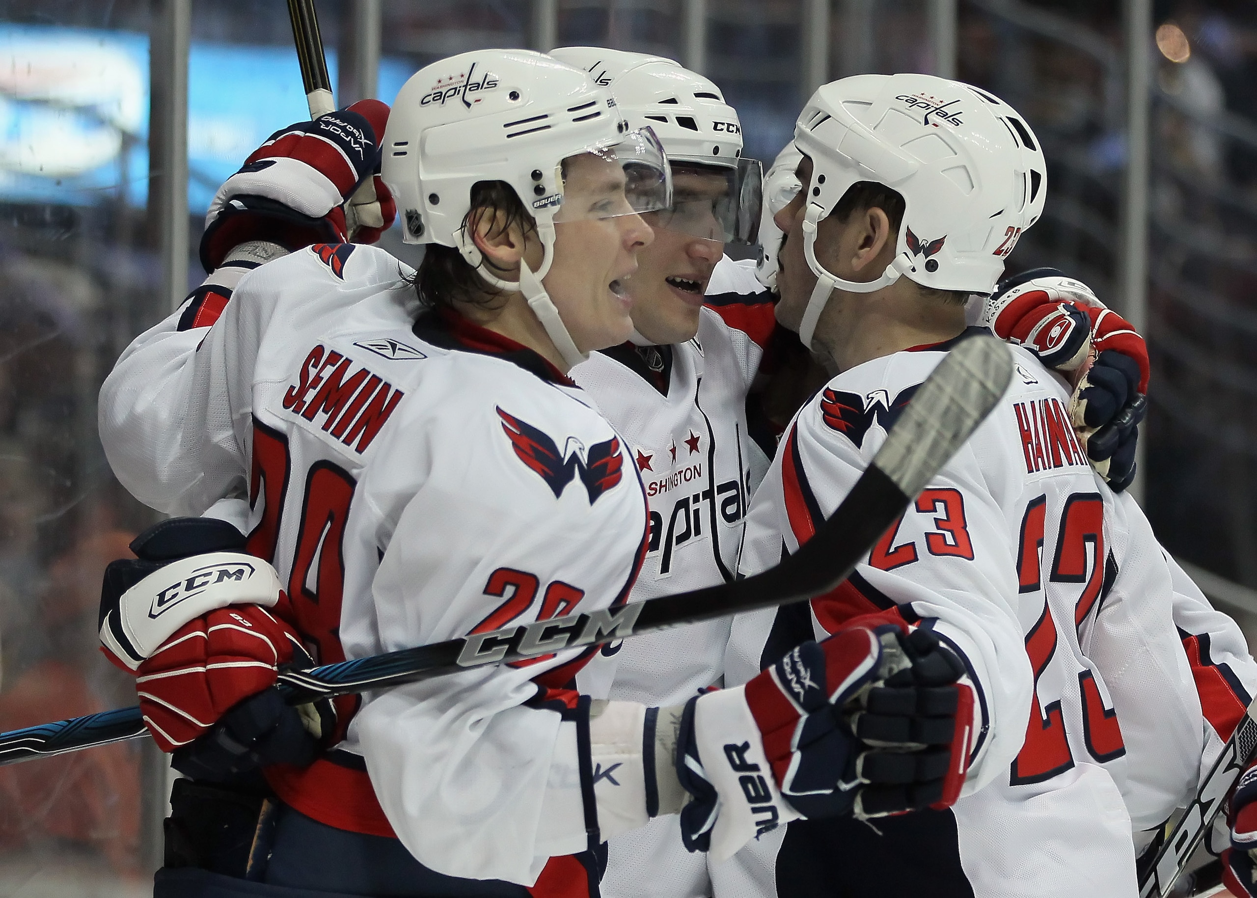 ANAHEIM, CA - FEBRUARY 16:  (L-R) Alexander Semin #28, Alex Ovechkin #8 and Dave Hannan #23 of the Washington Capitals celebrate Semin's first goal of the game against the Anaheim Ducks in the second period at the Honda Center on February 16, 2011 in Anah