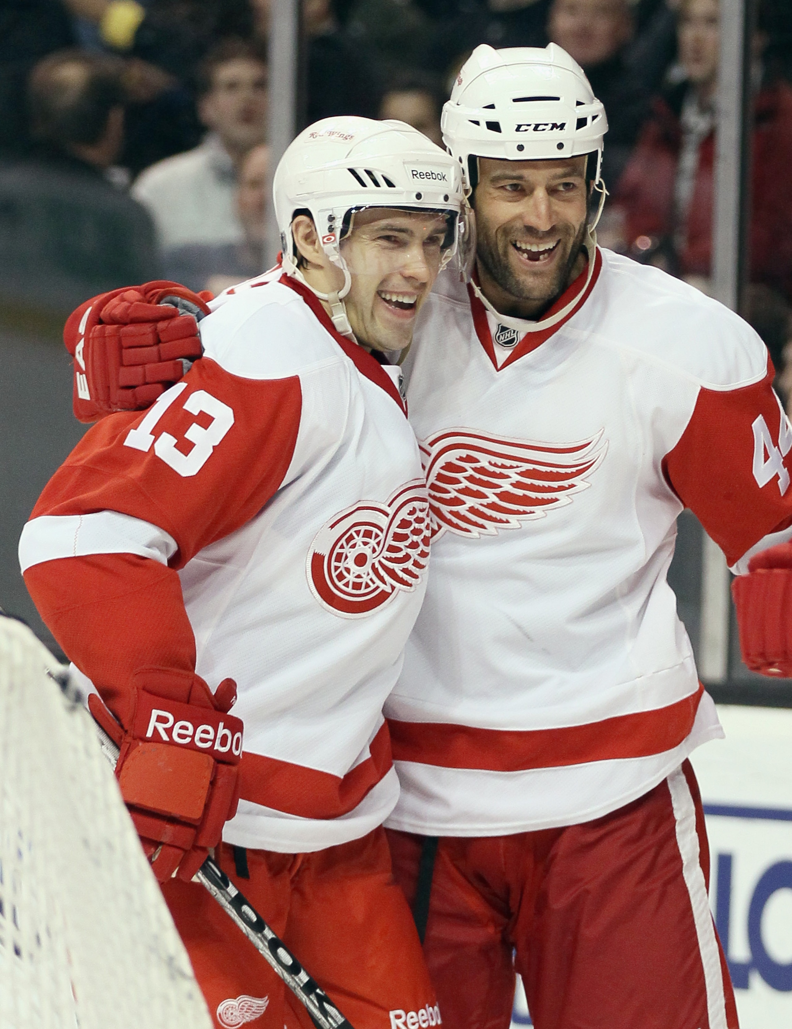 BOSTON, MA - FEBRUARY 11:  Todd Bertuzzi #44 of the Detroit Red Wings is congratulated by teammate Pavel Datsyuk #13 after Bertuzzi scored in the second period against the Boston Bruins on February 11, 2011 at the TD Garden in Boston, Massachusetts.  (Pho