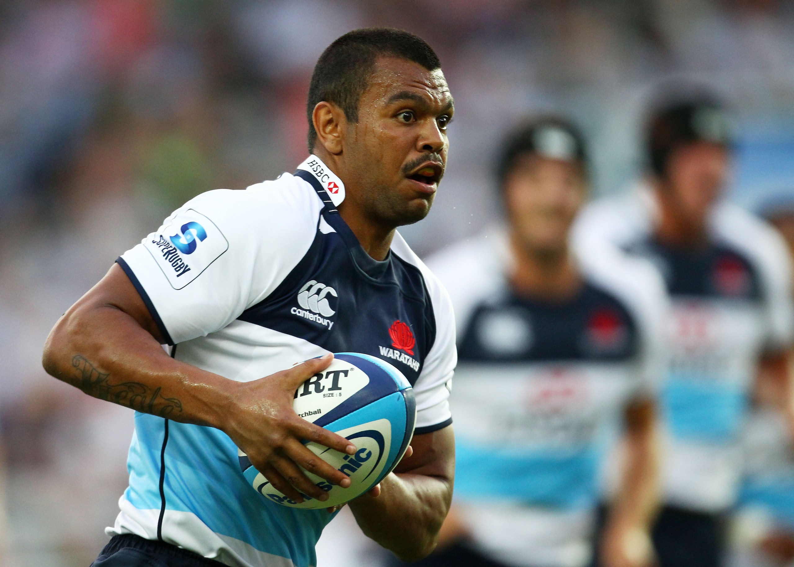 SYDNEY, AUSTRALIA - FEBRUARY 04: Kurtley Beale of the Waratahs runs the ball during the Super Rugby trial match between the Waratahs and Fiji Warriors at Sydney Football Stadium on February 4, 2011 in Sydney, Australia.  (Photo by Mark Nolan/Getty Images)