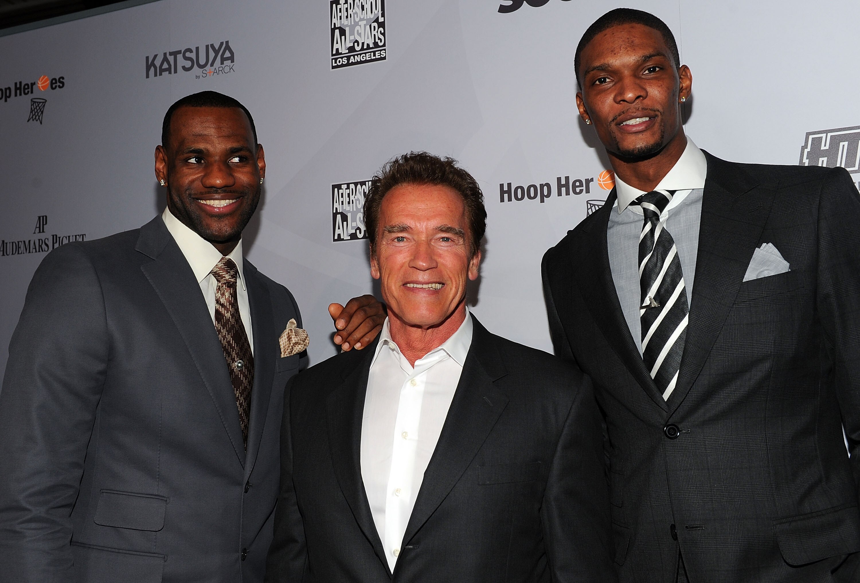 LOS ANGELES, CA - FEBRUARY 18:  NBA player LeBron James of the Miami Heat, Former California Goveror Arnold Schwarzenegger and NBA player Chris Bosh of the Miami Heat attend After-School All-Stars (ASAS) Hoops Heroes Salute VIP after party at Katsuya, LA