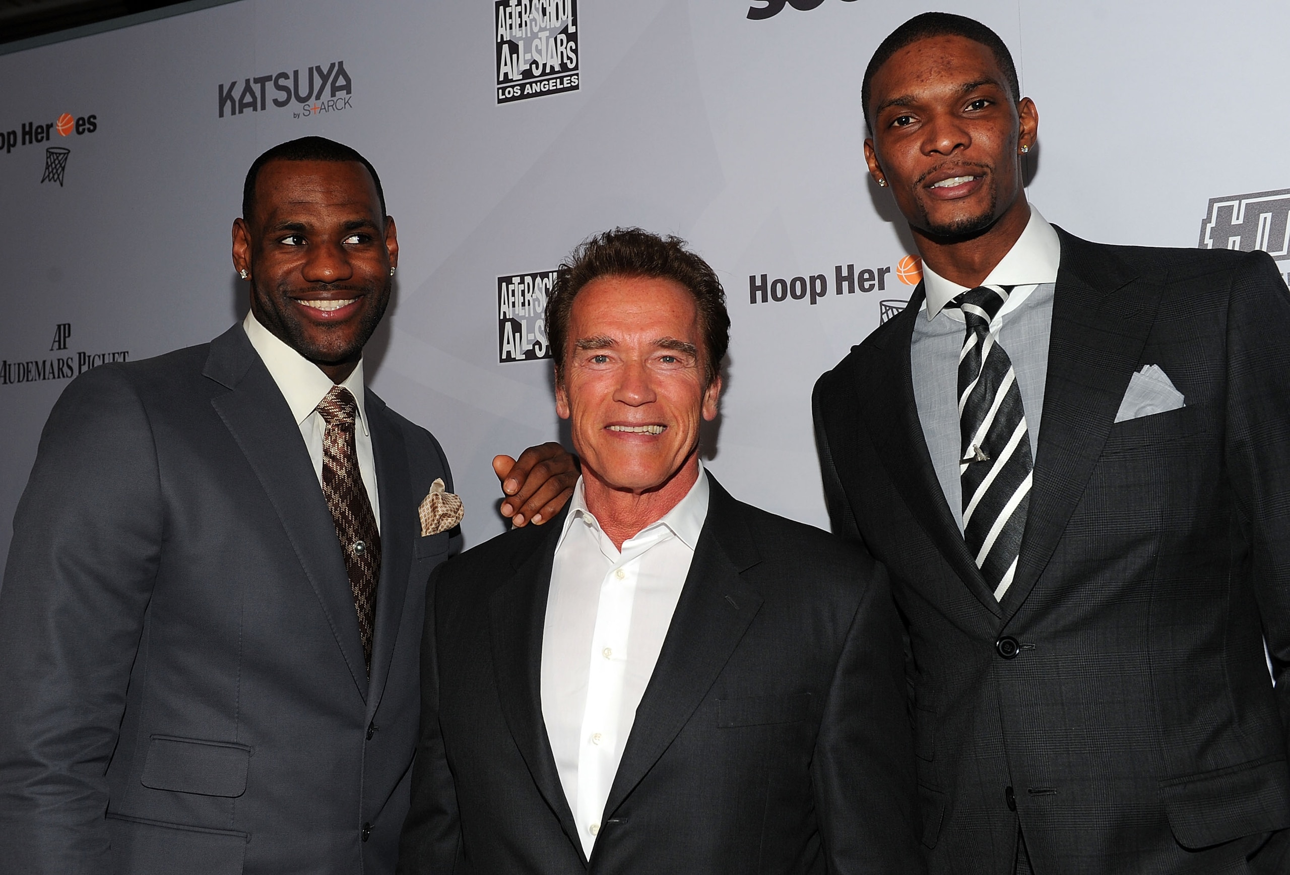 LOS ANGELES, CA - FEBRUARY 18:  NBA player LeBron James of the Miami Heat, Former California Goveror Arnold Schwarzenegger and NBA player Chris Bosh of the Miami Heat attend After-School All-Stars (ASAS) Hoops Heroes Salute VIP after party at Katsuya, LA